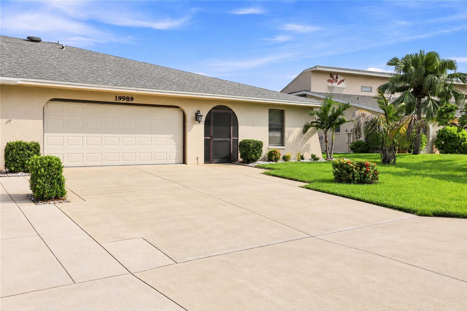 Virtually altered to show clean driveway