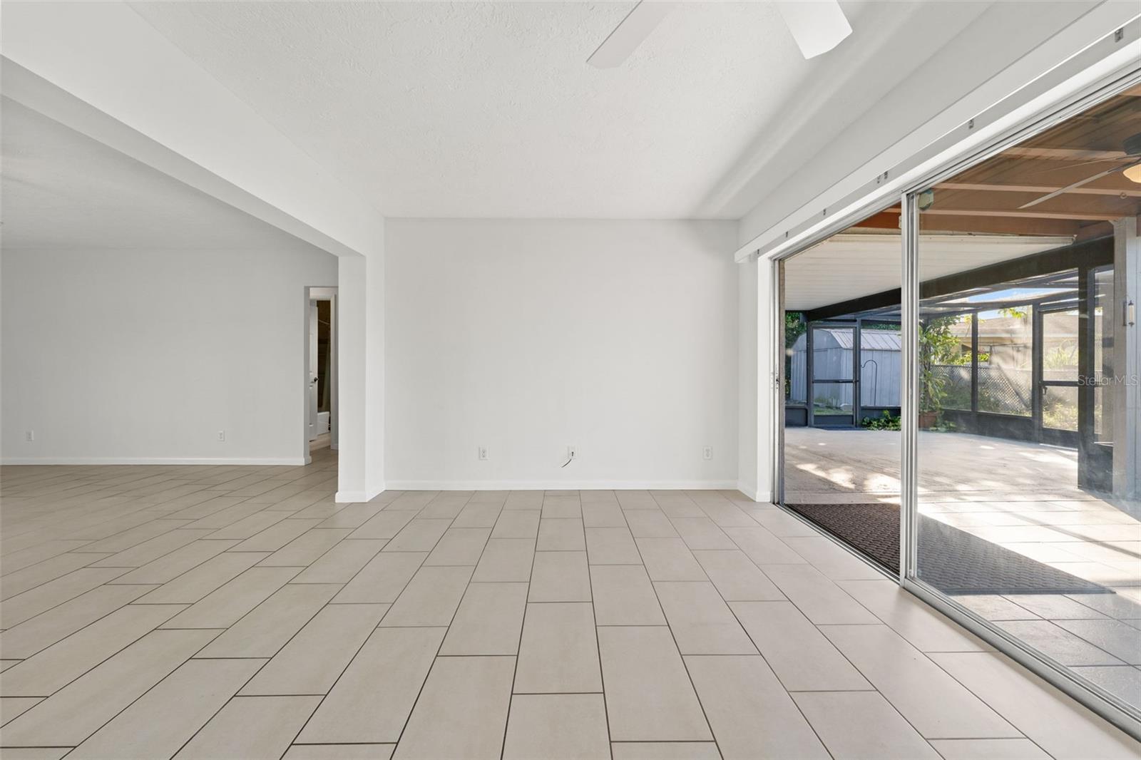 Florida room opens to expansive lanai