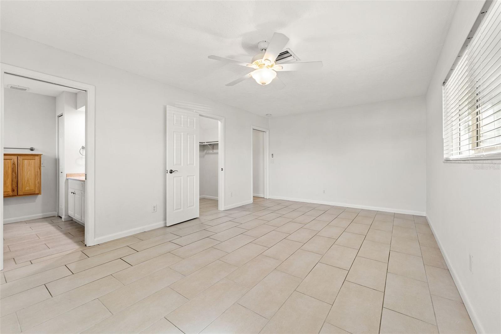 Primary with walk-in closet and ensuite bath