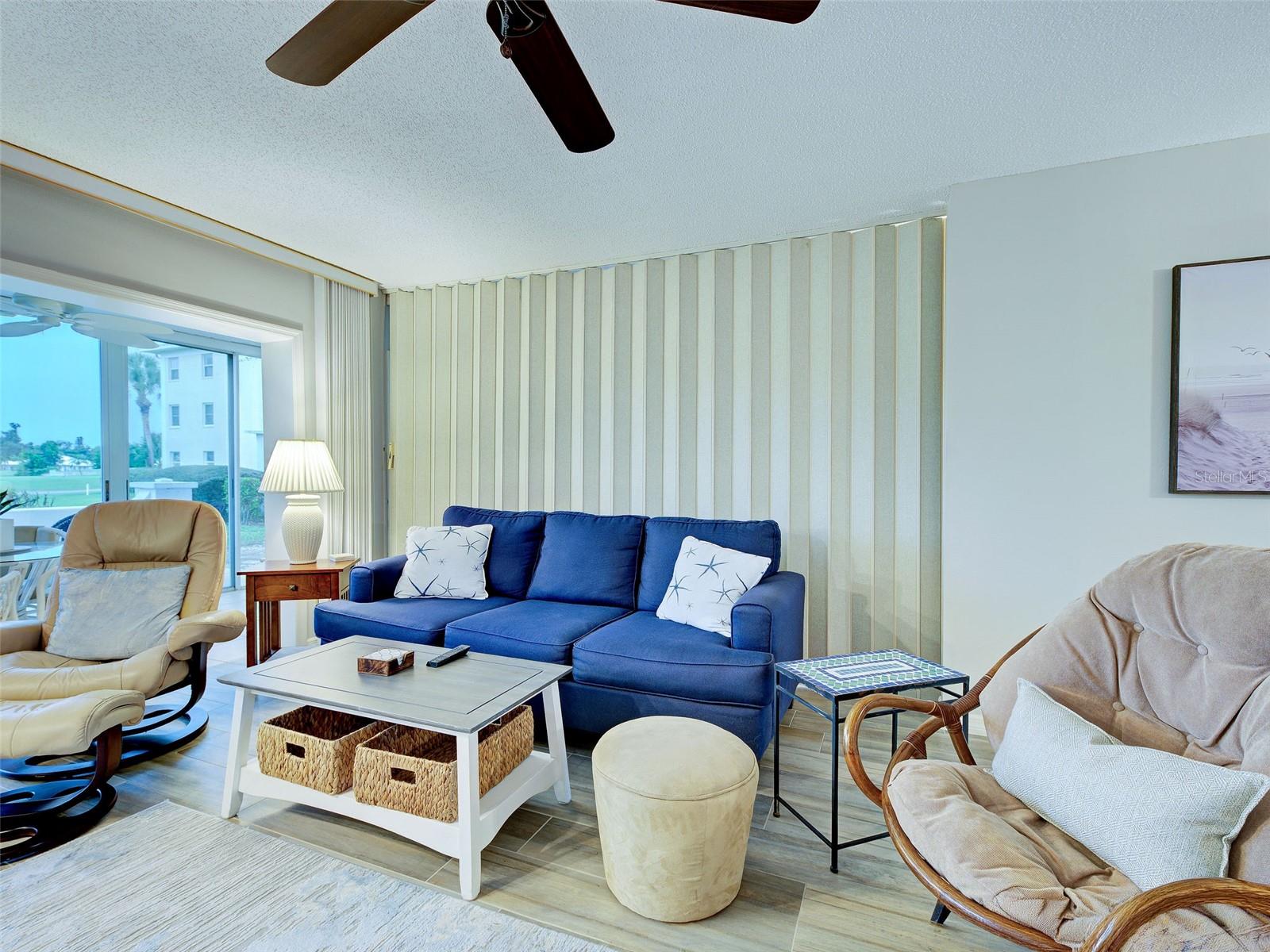 Living Room with the foldable wall to create extra bedroom when needed for guests.