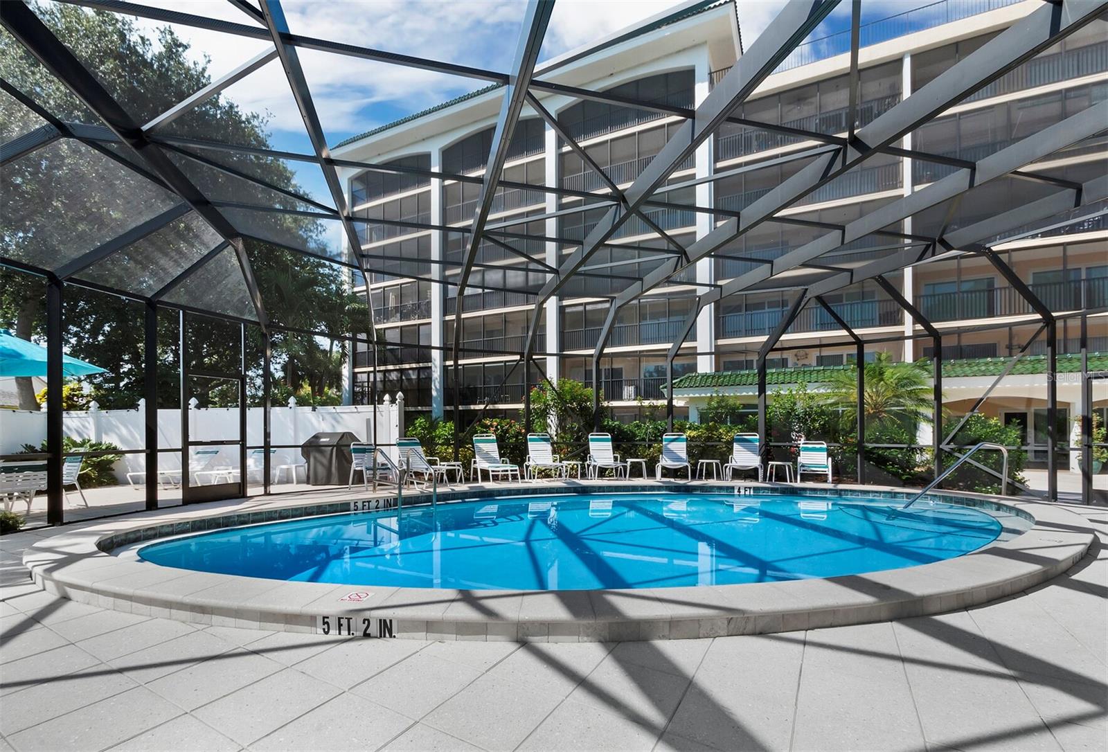 Enjoy a refreshing swim in the screened community pool, sheltered from insects