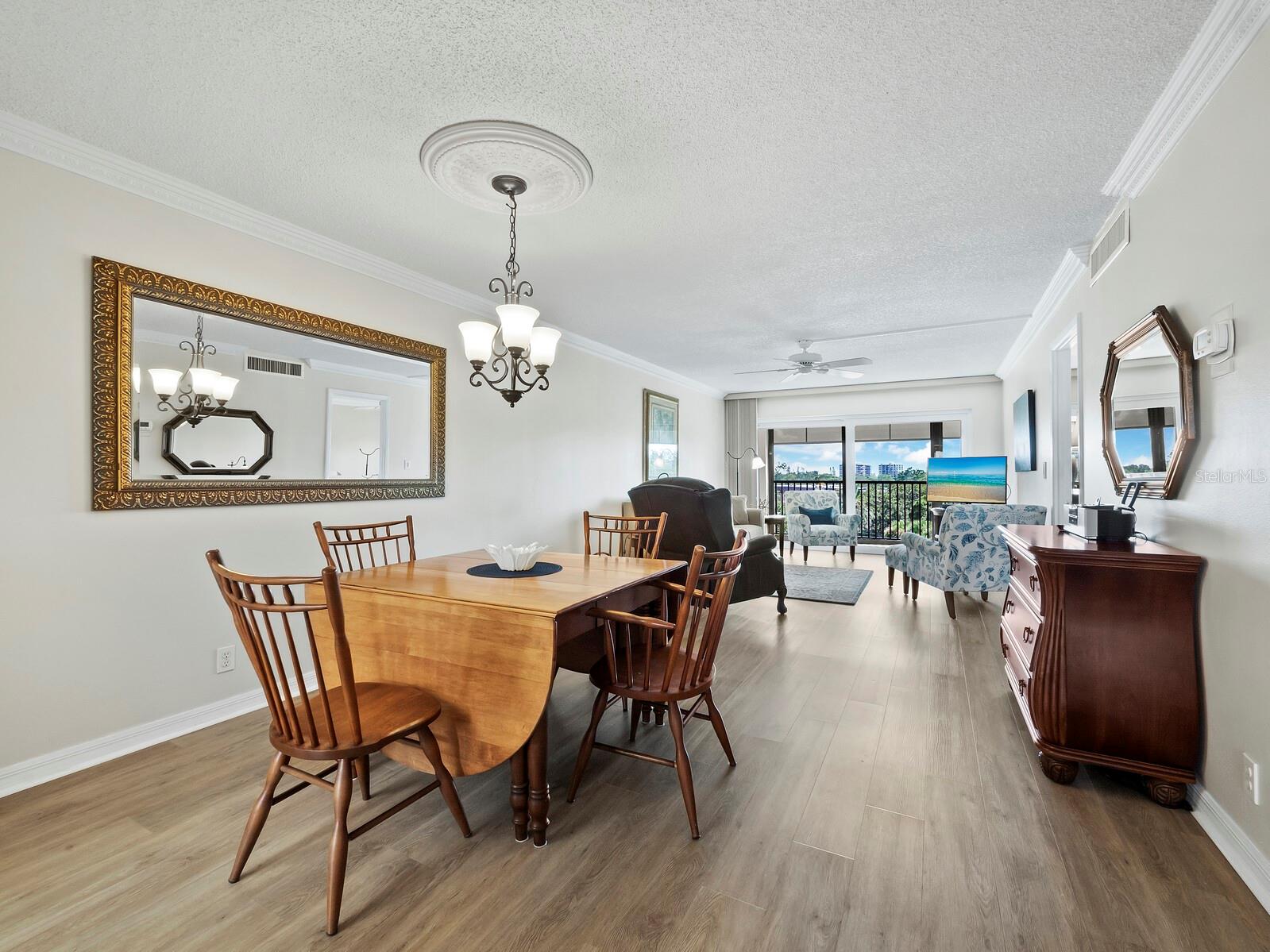 Combined dining and living room leading to the lanai
