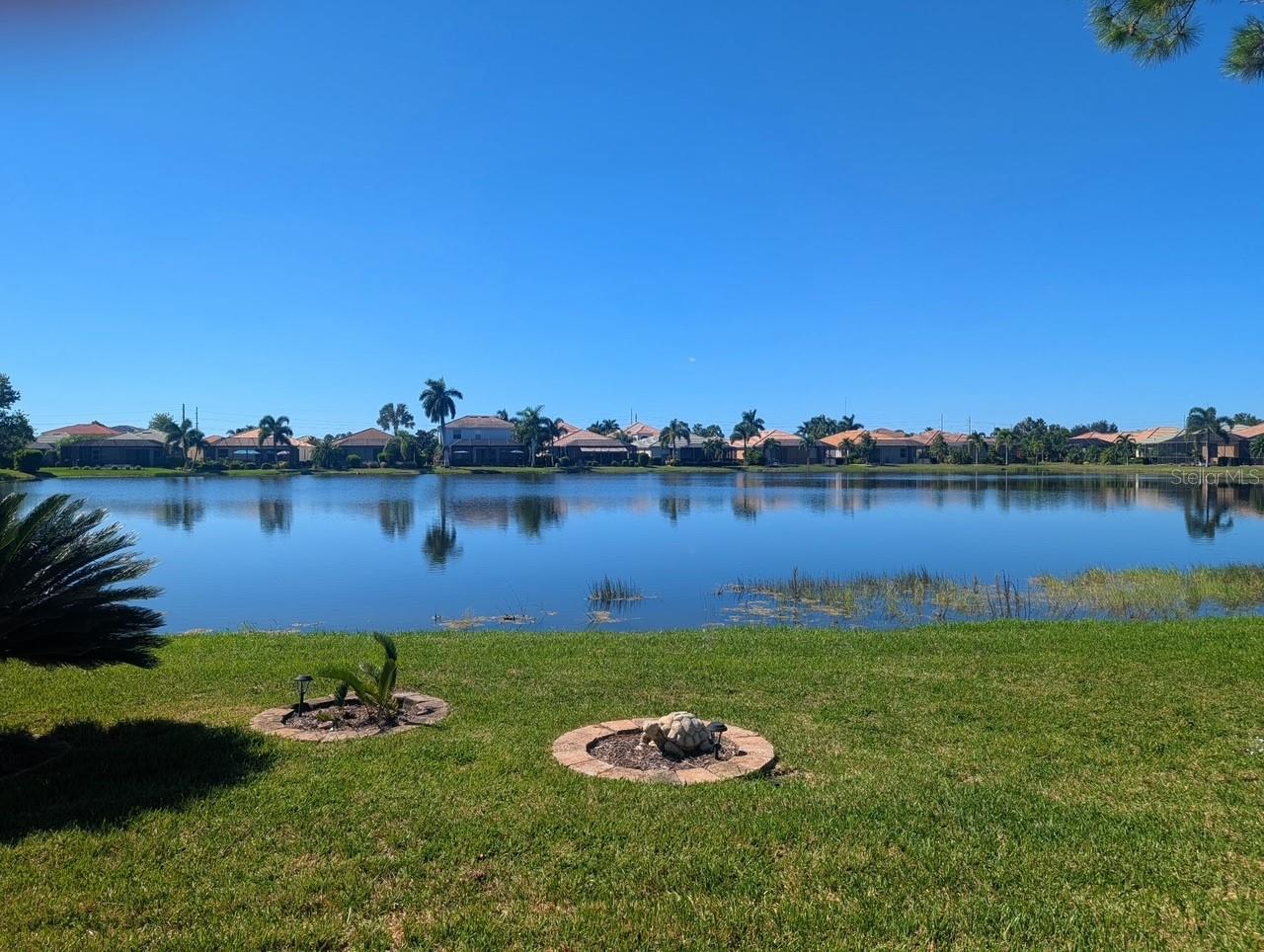 Daytime views of the lake from Lanai & Primary Bedroom