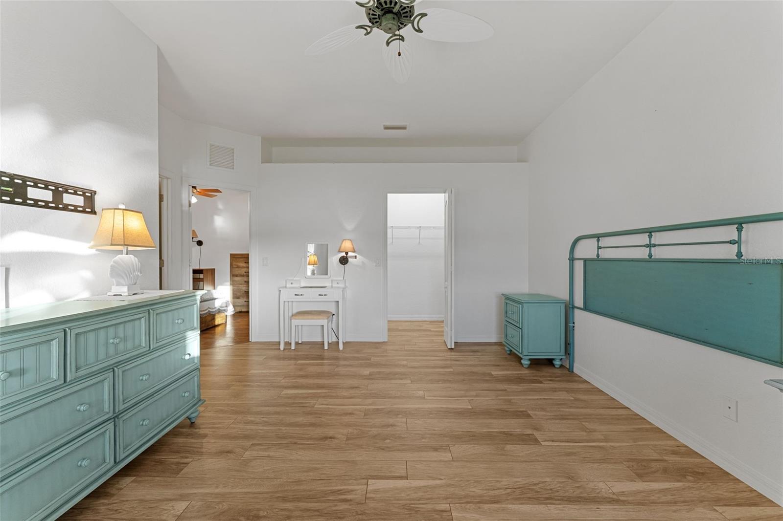 Walk-in closet straight ahead, adjoining room to the left