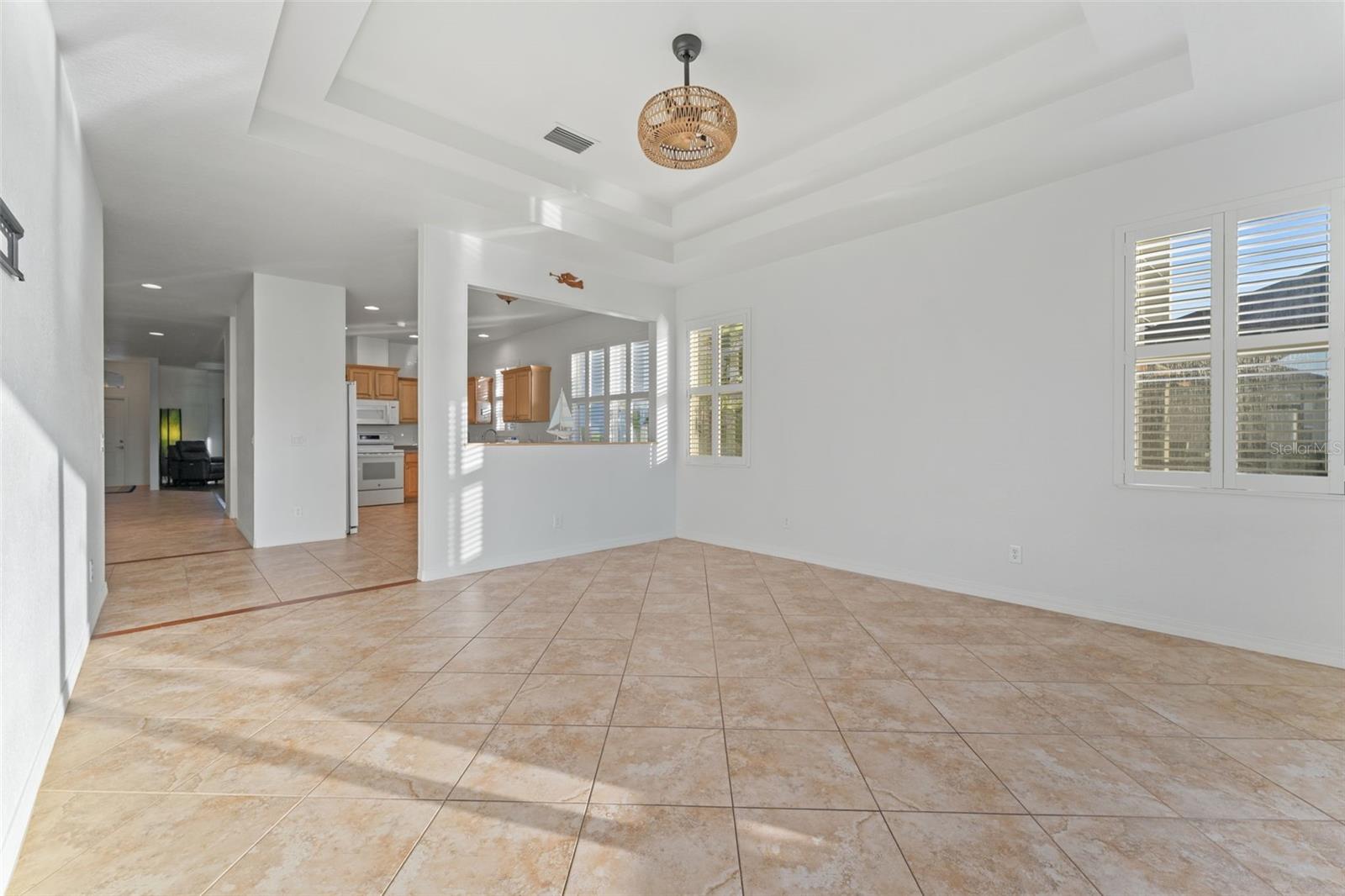 Family Room on other side of kitchen with cut-thru wall