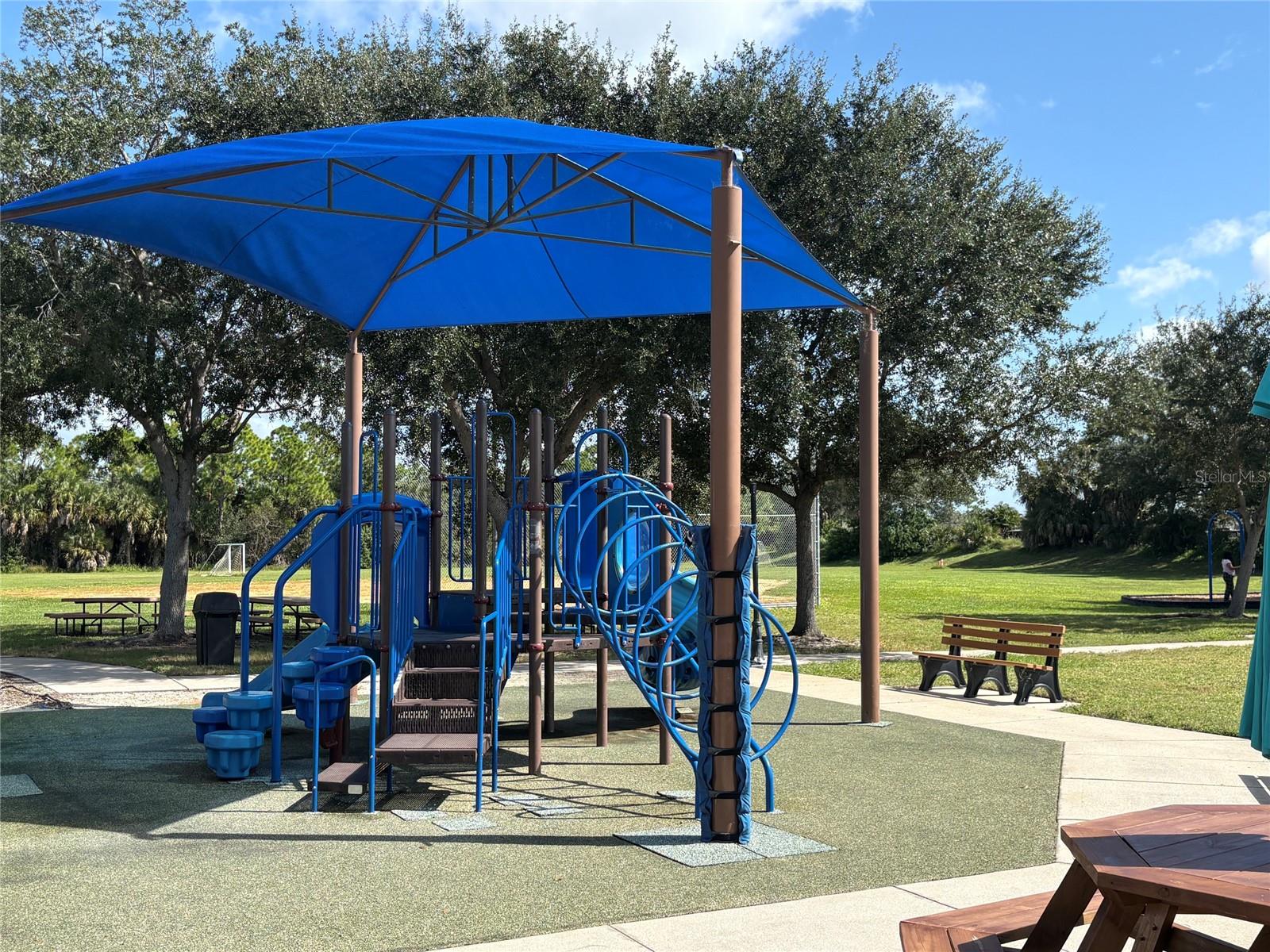 Covered children's play equipment