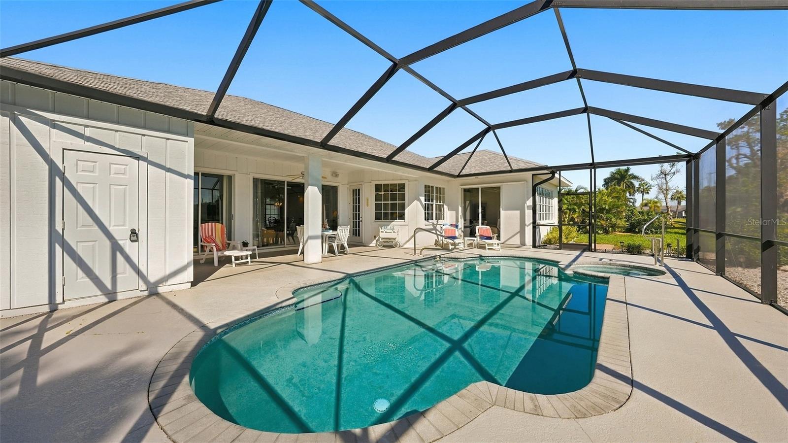 notice the storage room door just off from pool