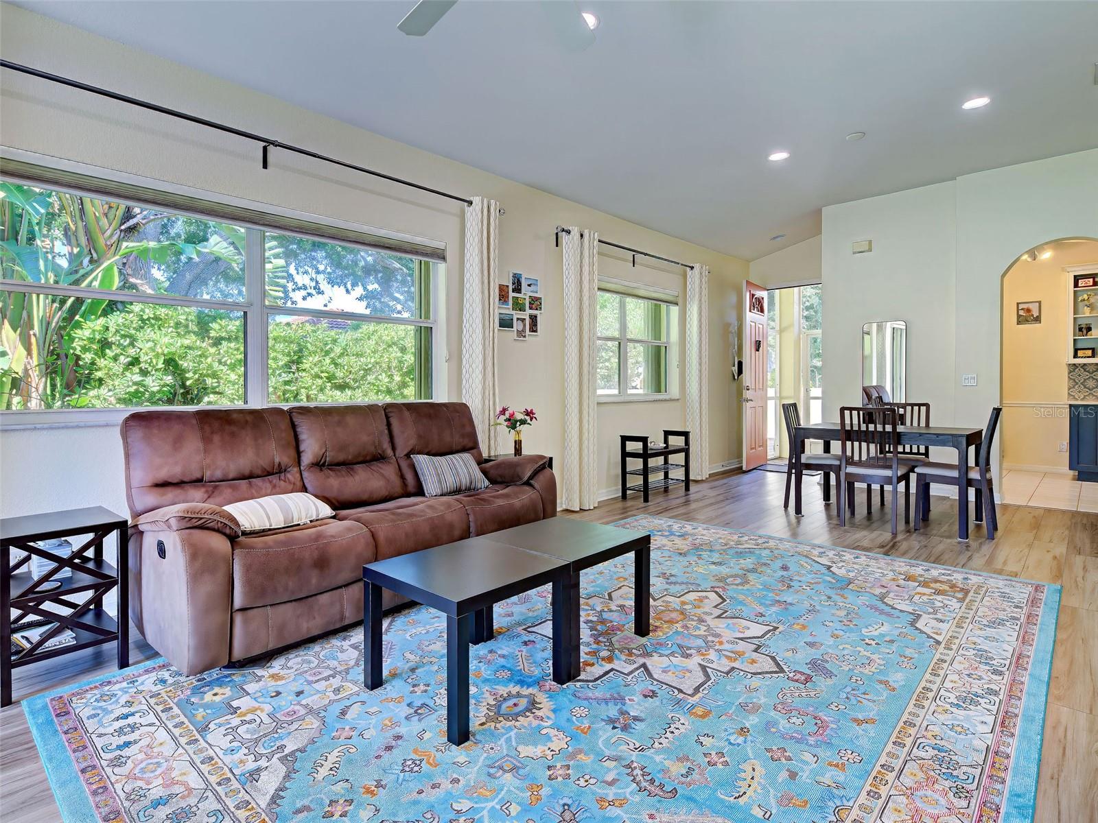 Living room and dining room has plenty of natural light