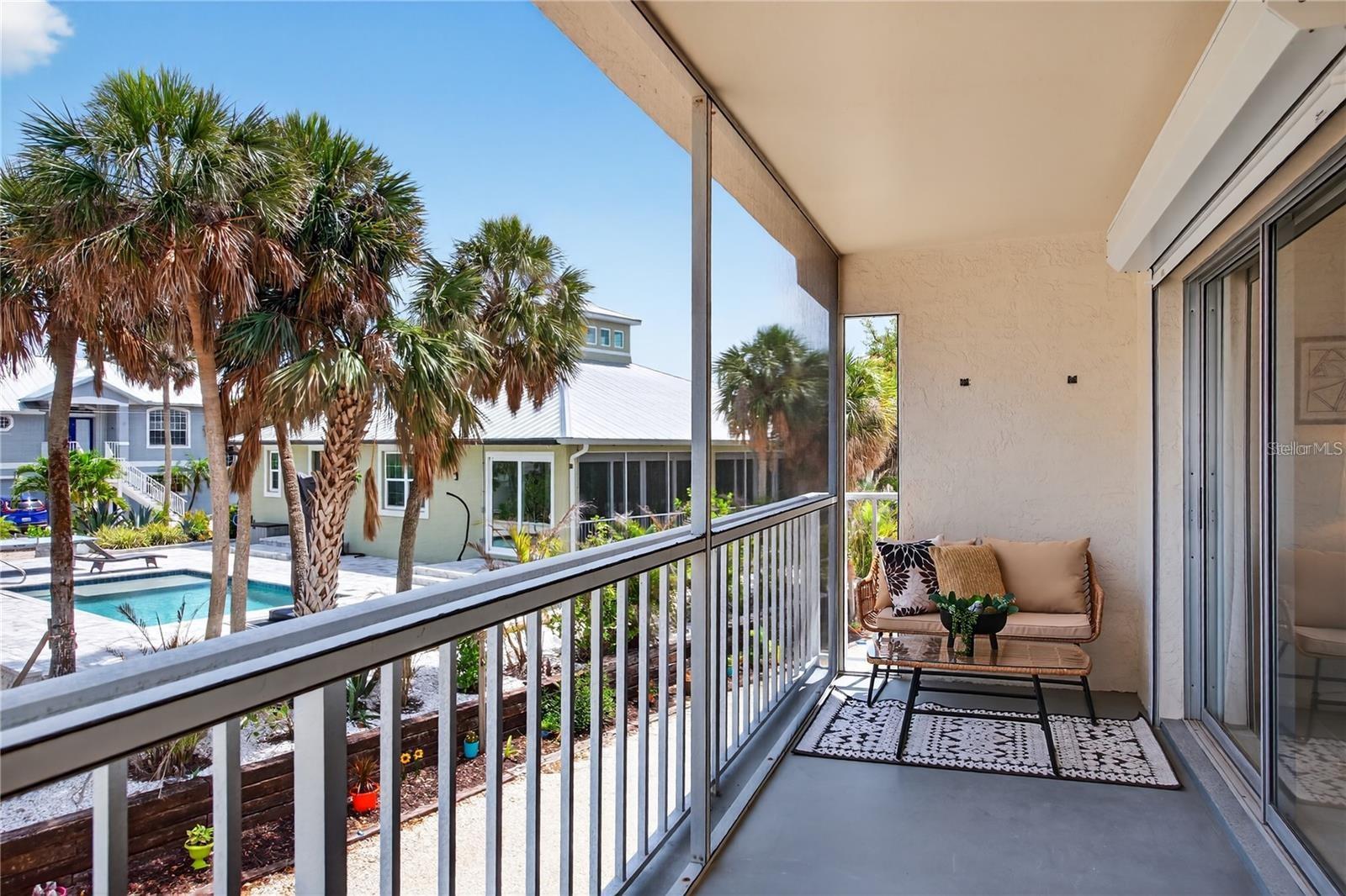Lanai Directly Off of Living Room and Primary Bedroom with Peekaboo Views to Lemon Bay