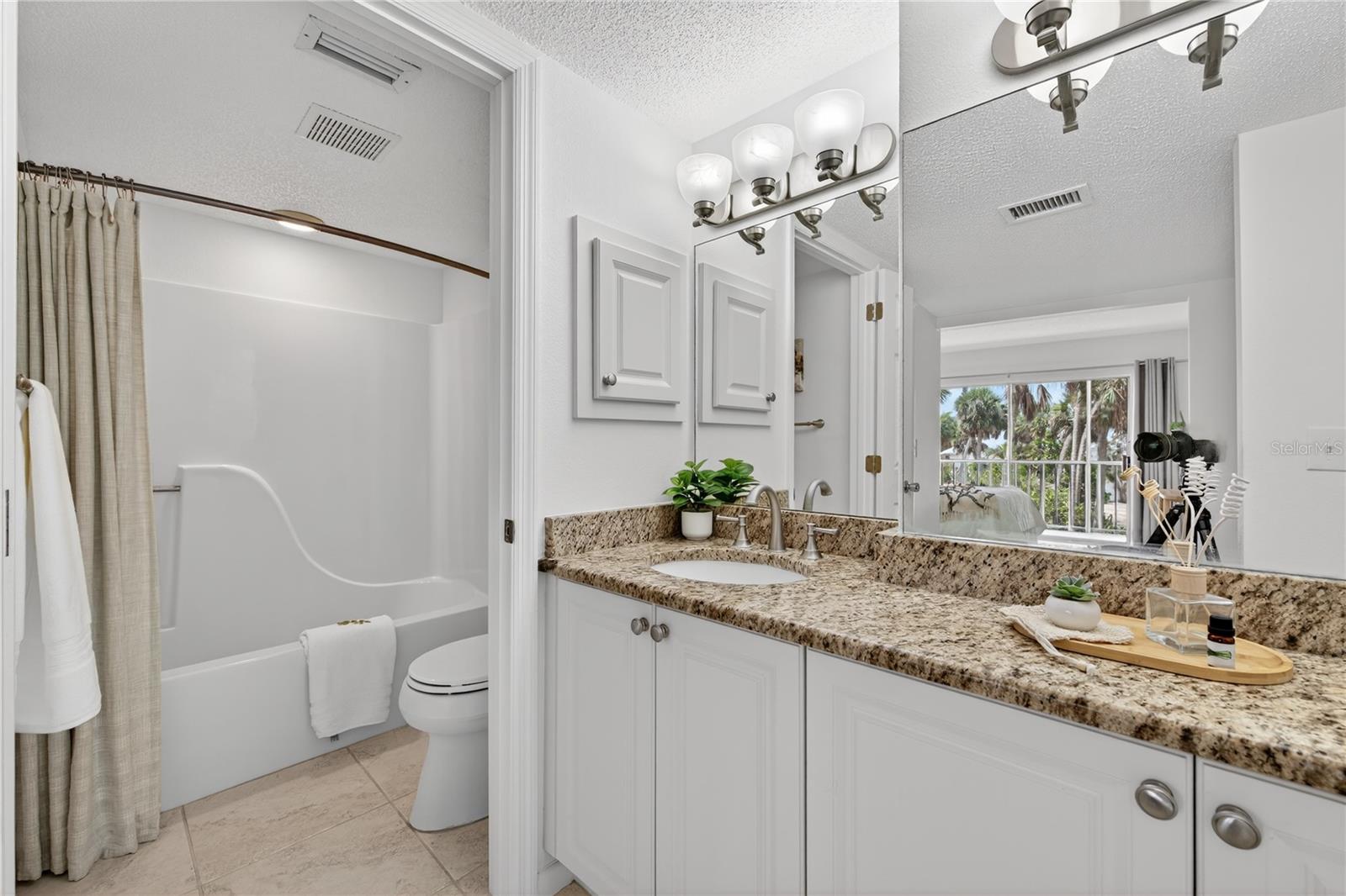 Tub and Shower Combination in Primary Ensuite Bedroom