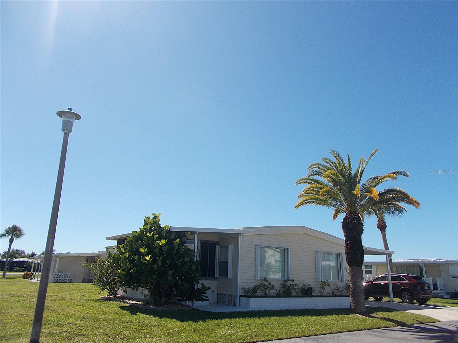 Front view showing corner lot