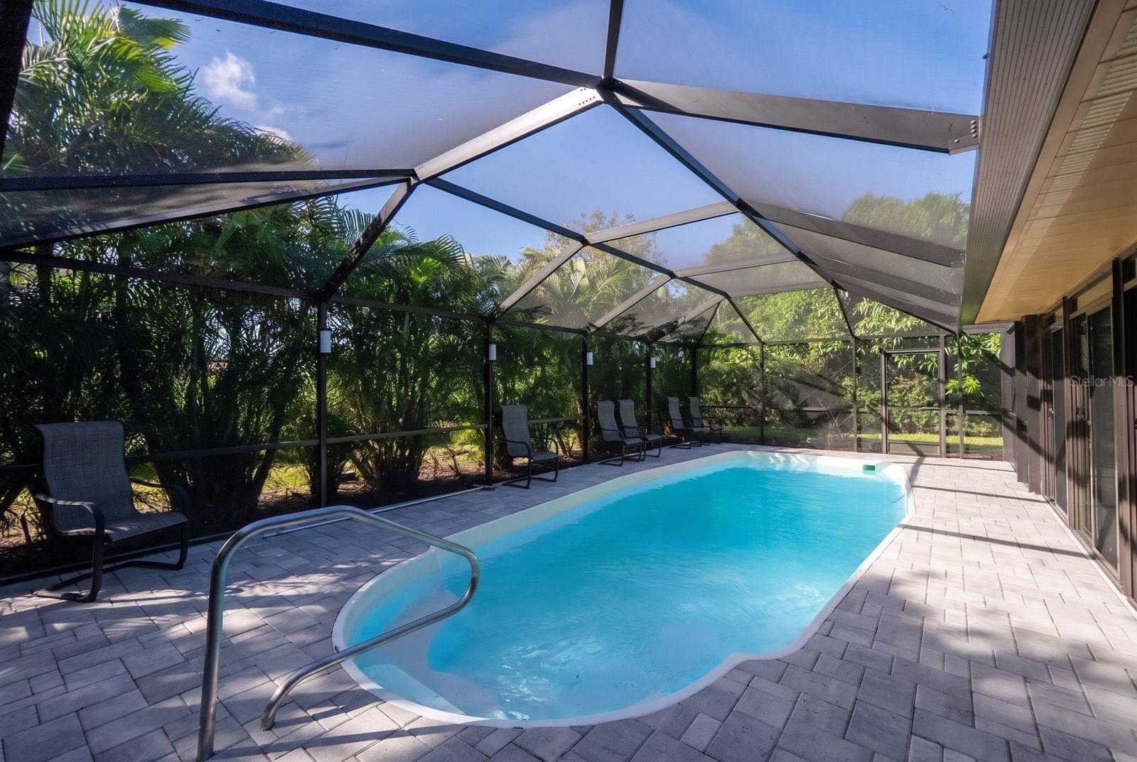 heated pool with paver patio