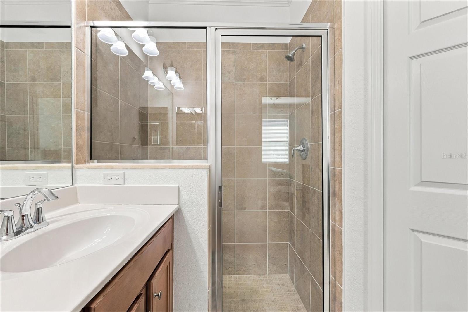 Glass Over-Sized Stall Shower in Primary Bath
