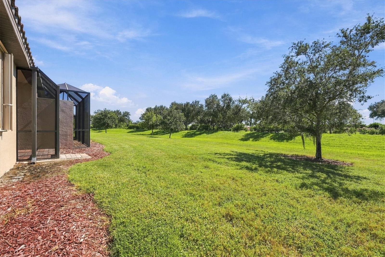 Expansive Rear View of Villa Grounds