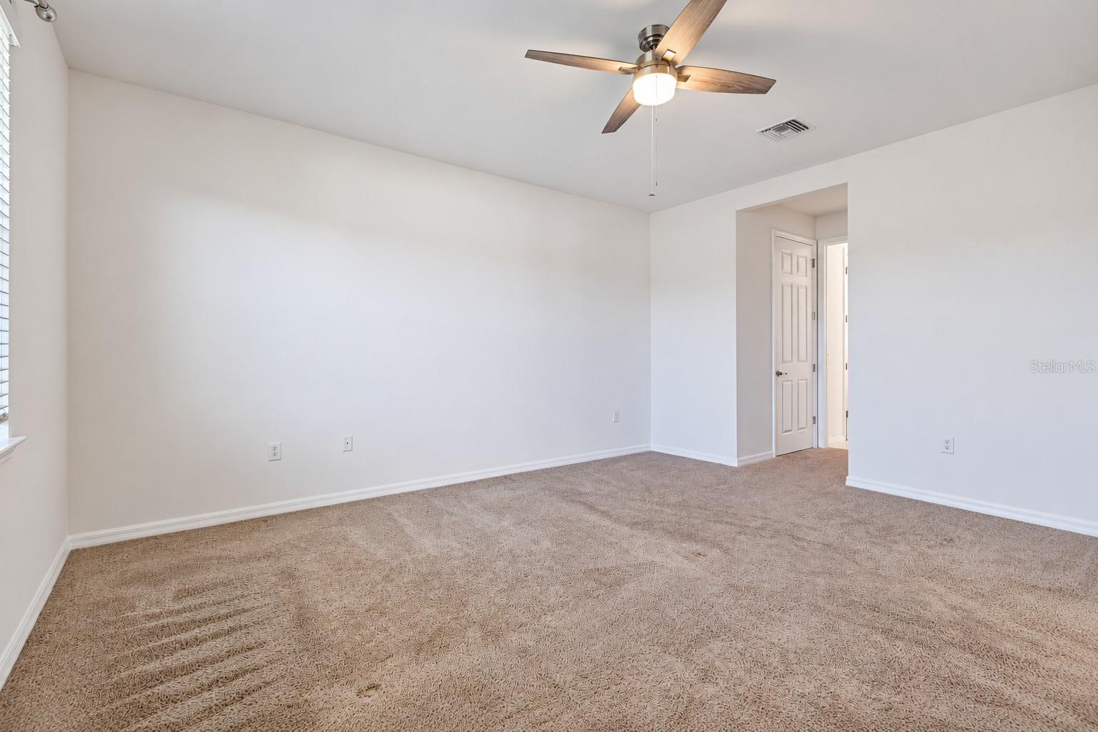 Empty primary bedroom