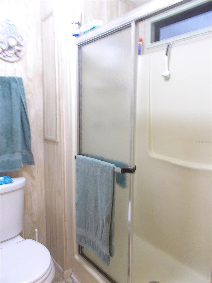 Ensuite bathroom walk-in shower & comode