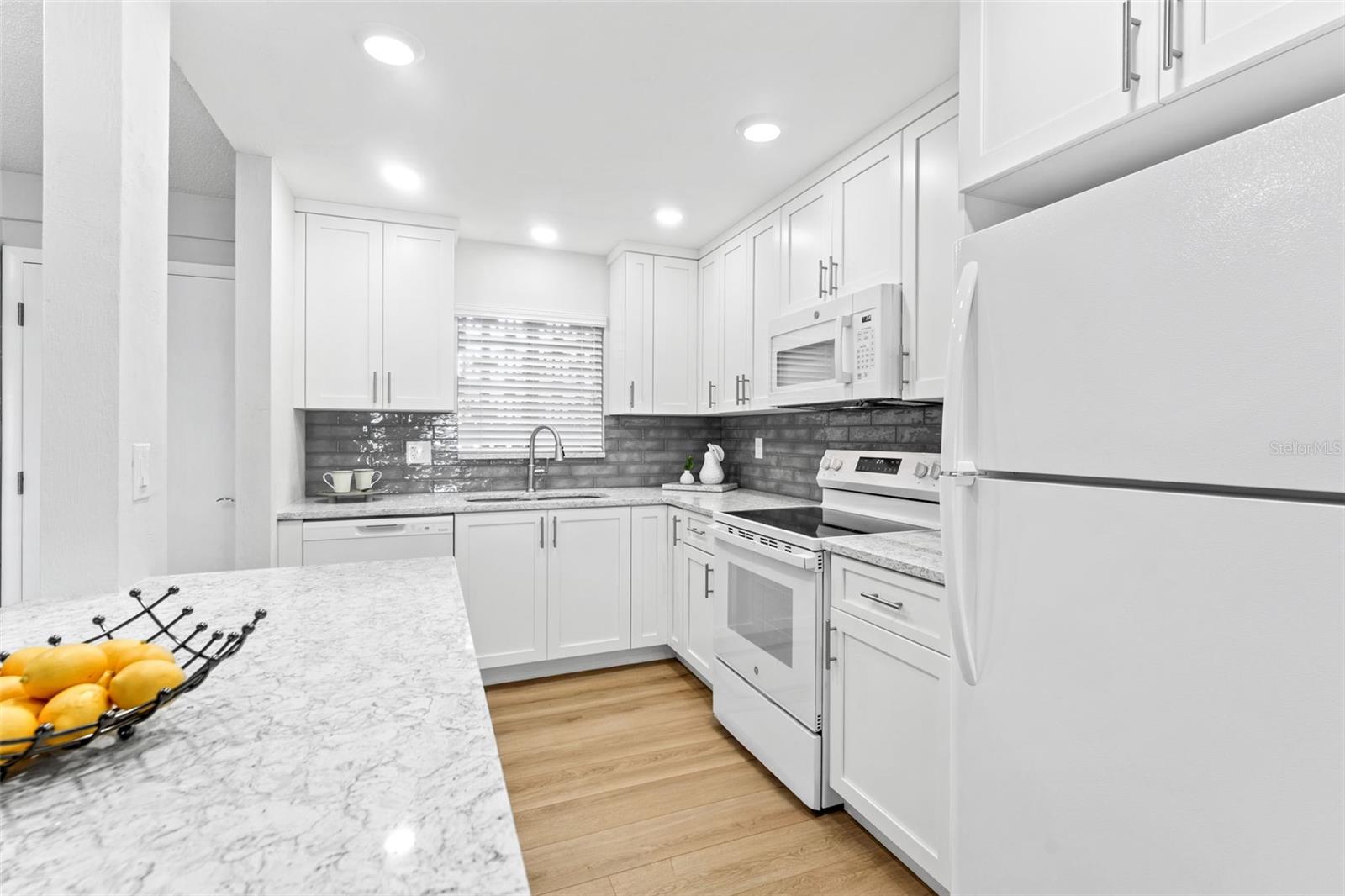 Cambria quartz countertops throughout.