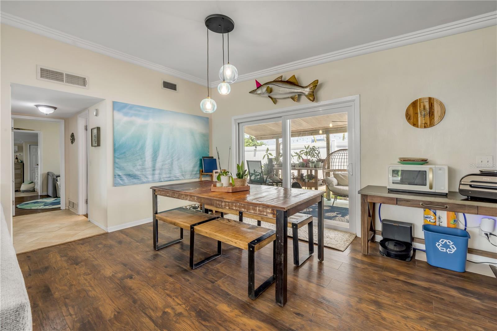 Dining area connecting the living space and kitchen.