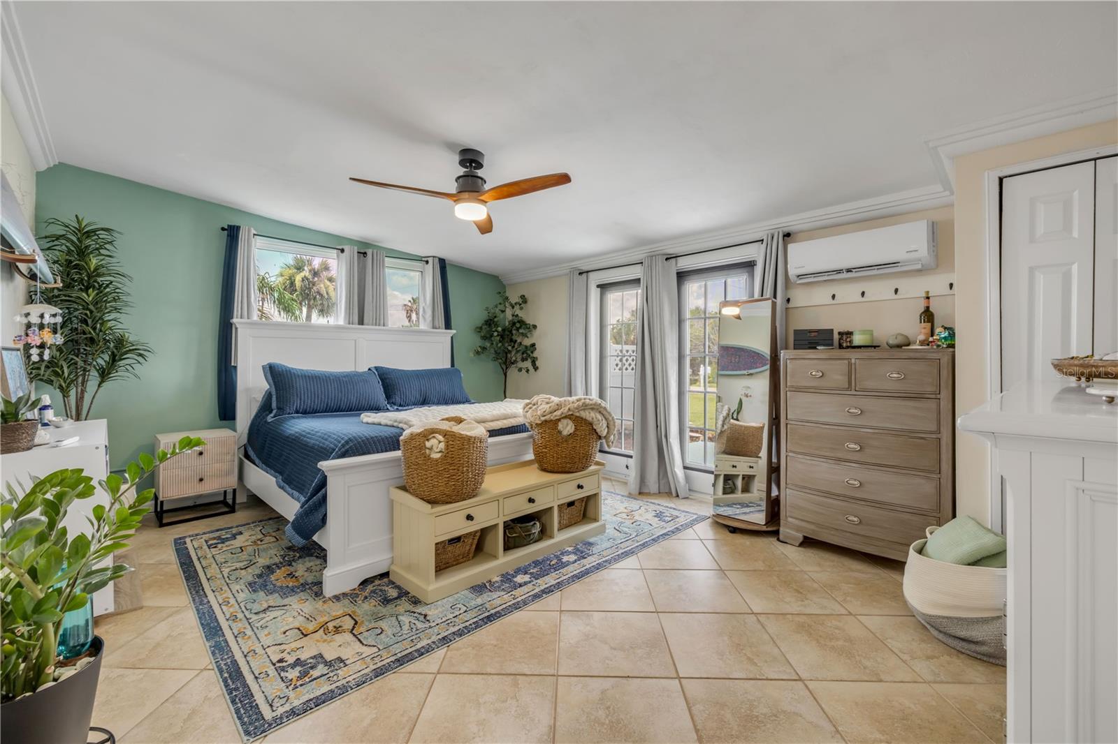 Additional living space with seating and access to adjoining rooms.