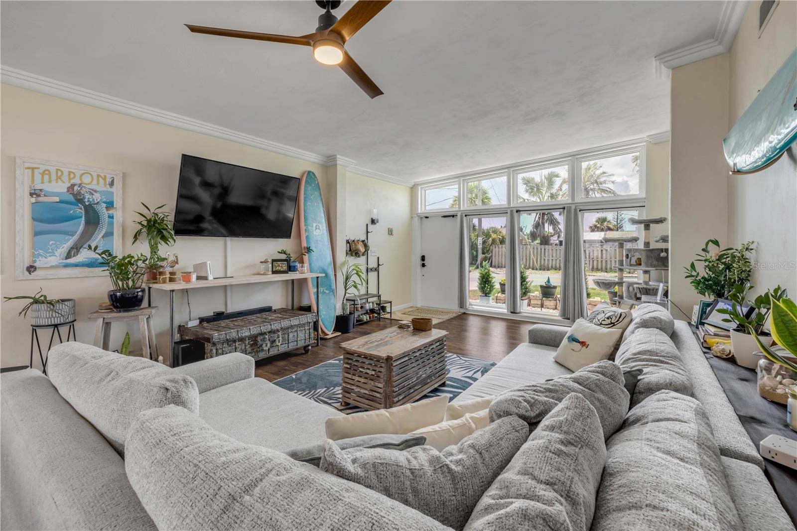 Living room with generous windows and natural light.