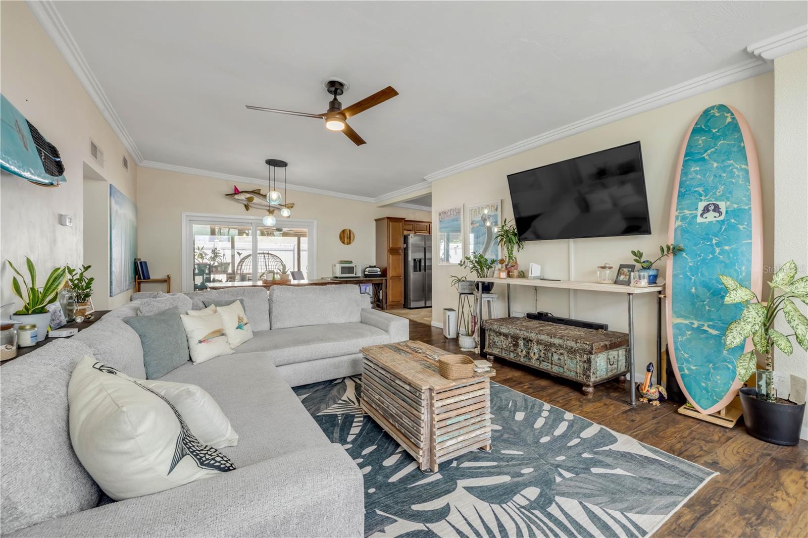 Alternate living-room view showing the seating area and room layout.
