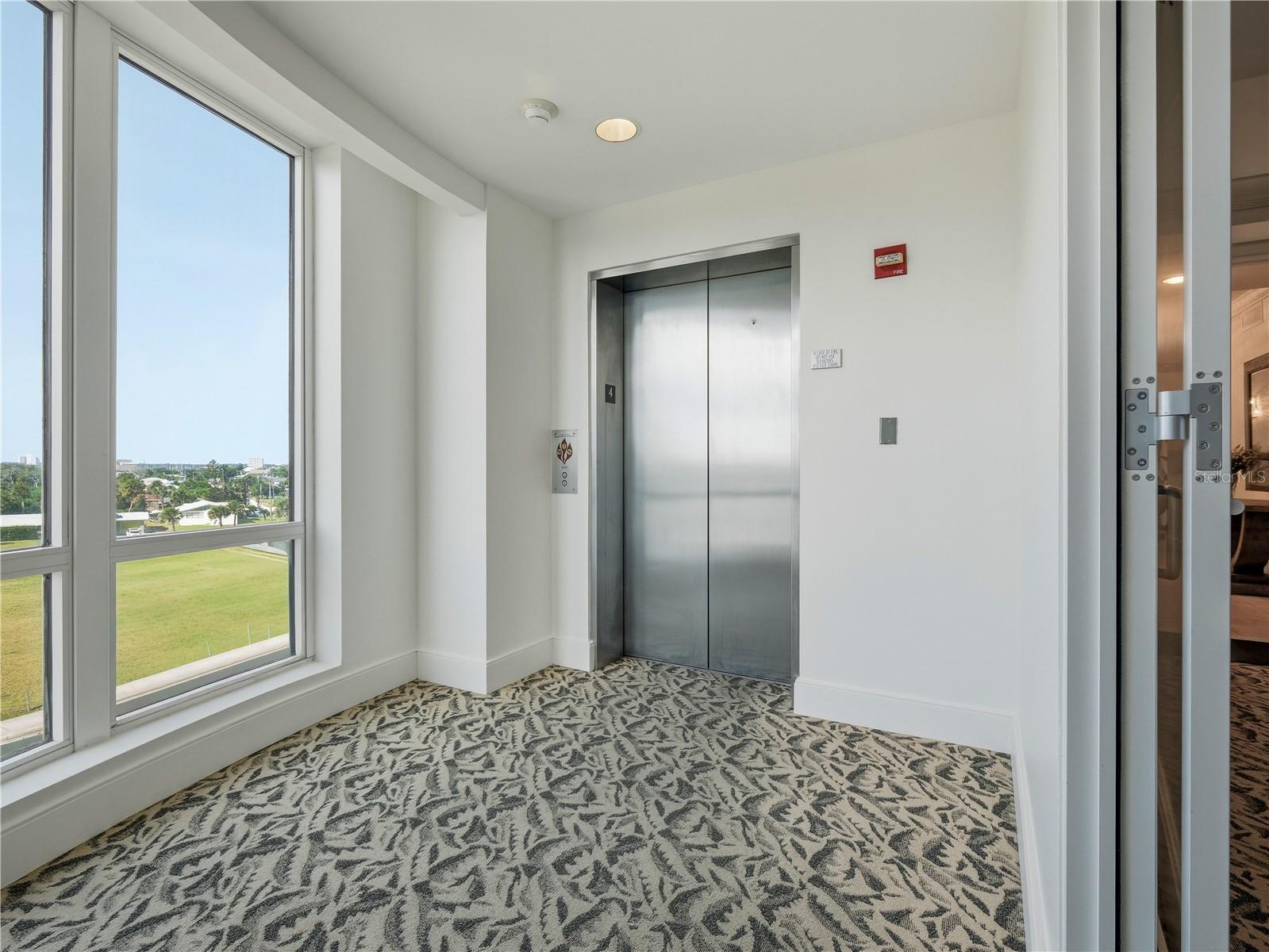 ELEVATOR LOCATED NEXT TO UNIT