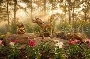 Disney friends in nature sculpture