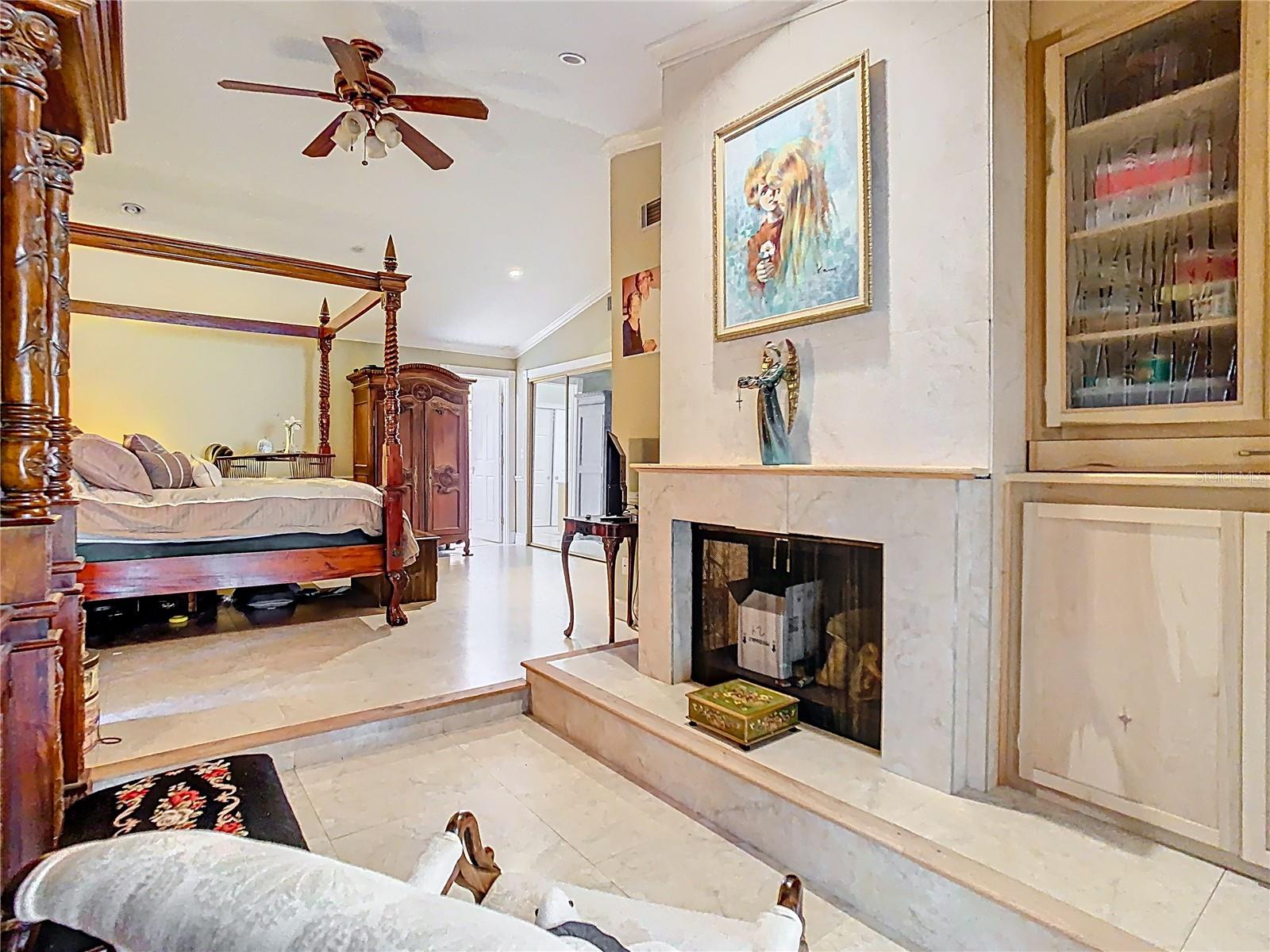 Primary Bedroom w/view of Fireplace