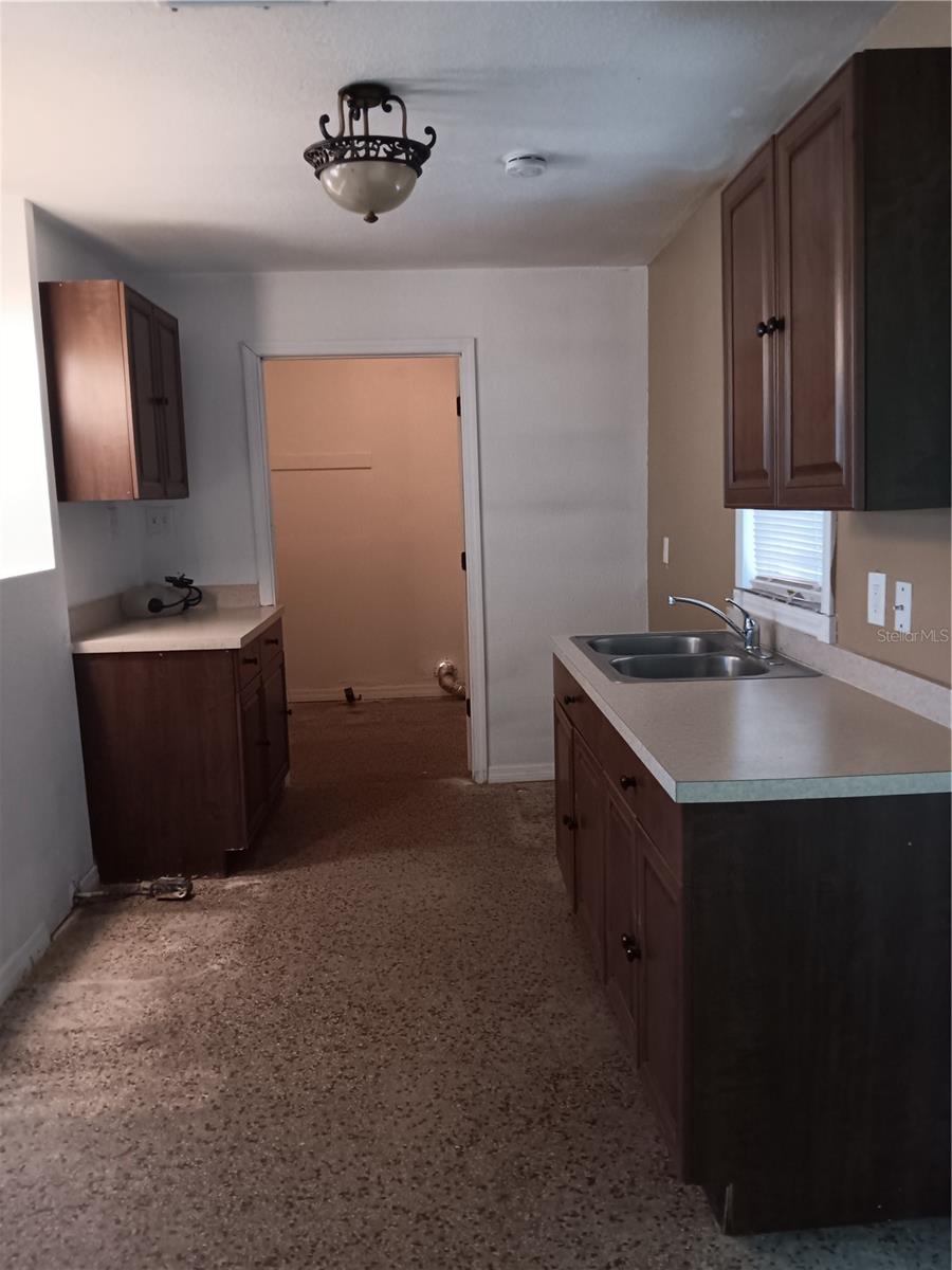 View of kitchen toward laundry room