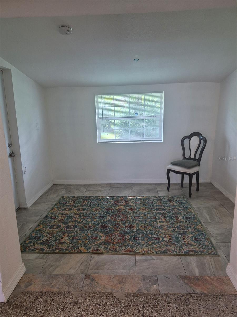 Actual bonus room with view of backyard