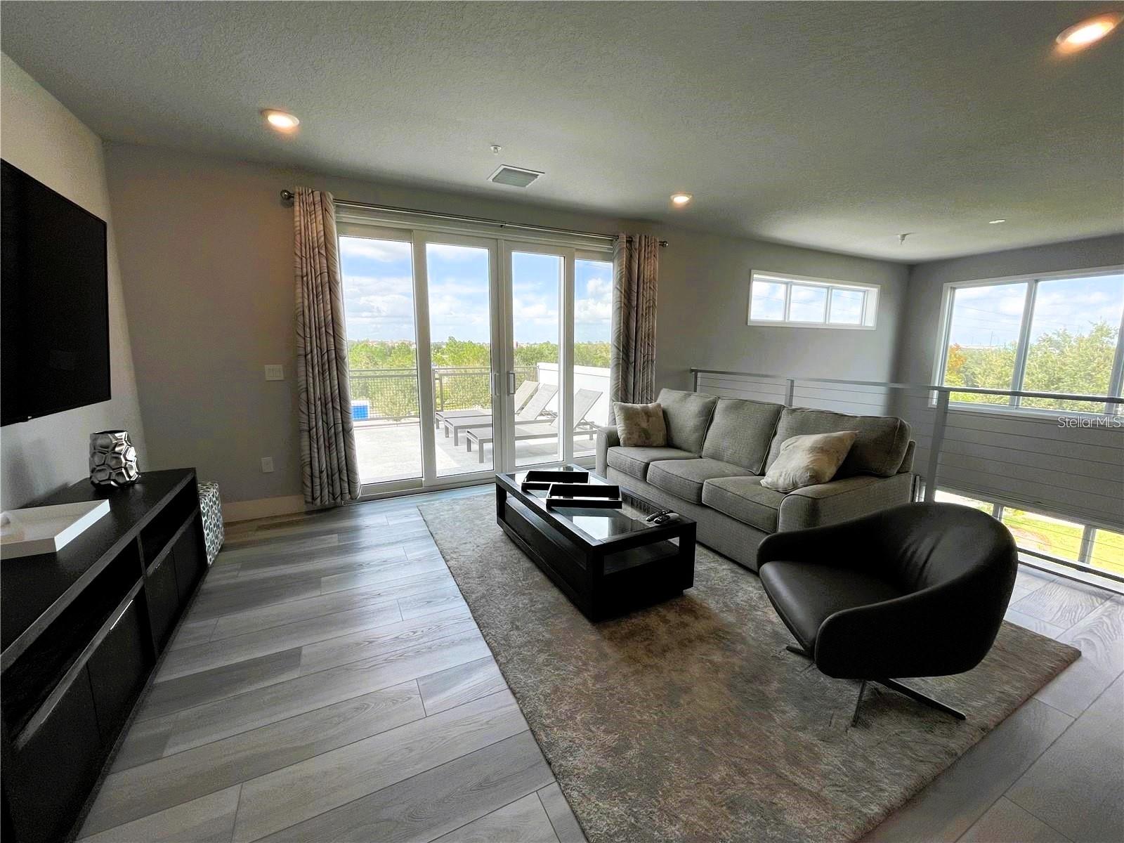 7740 SANDY RIDGE DRIVE, #203, Reunion, FL 34747