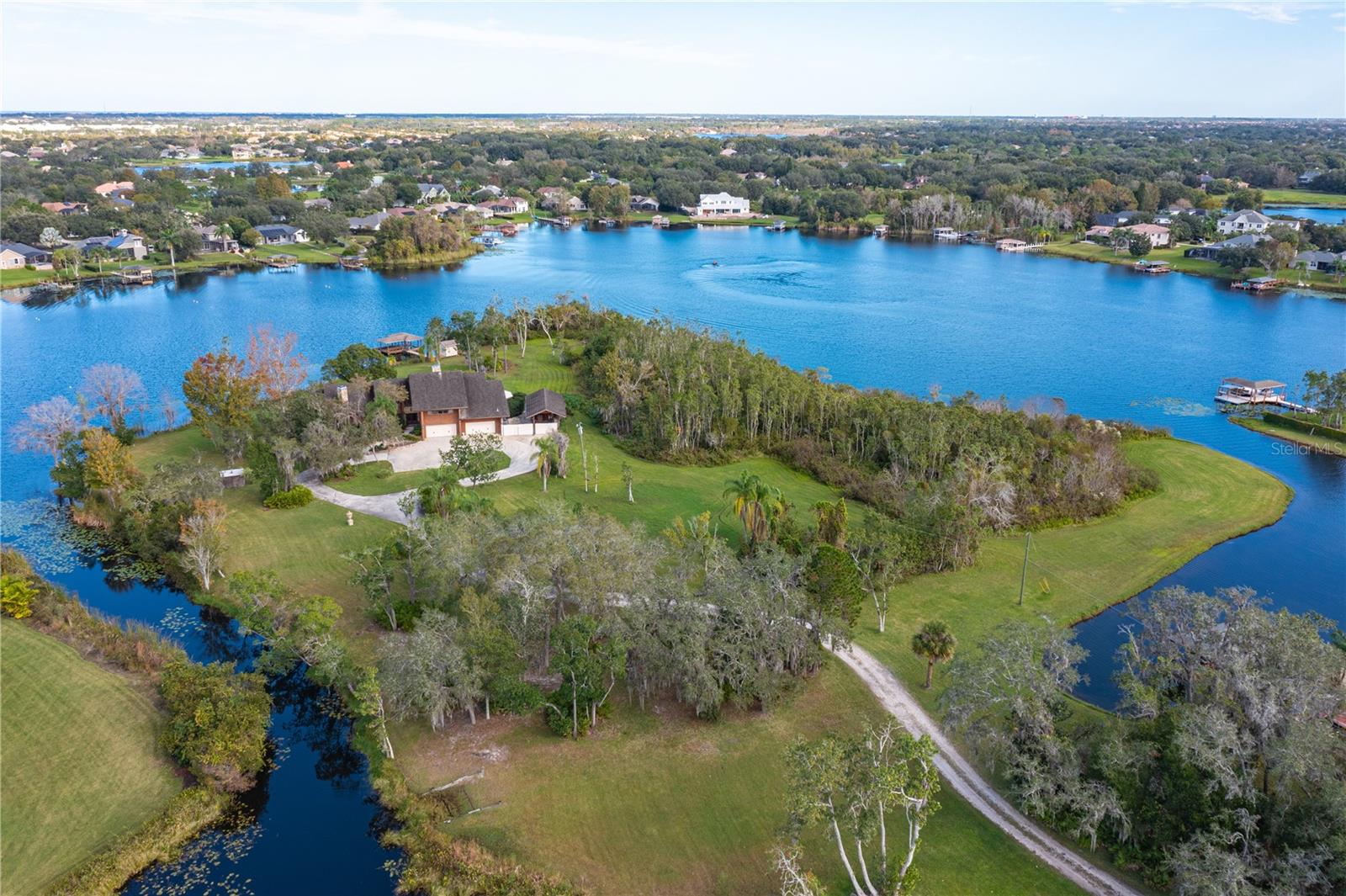 Aerial of property w existing tear down home