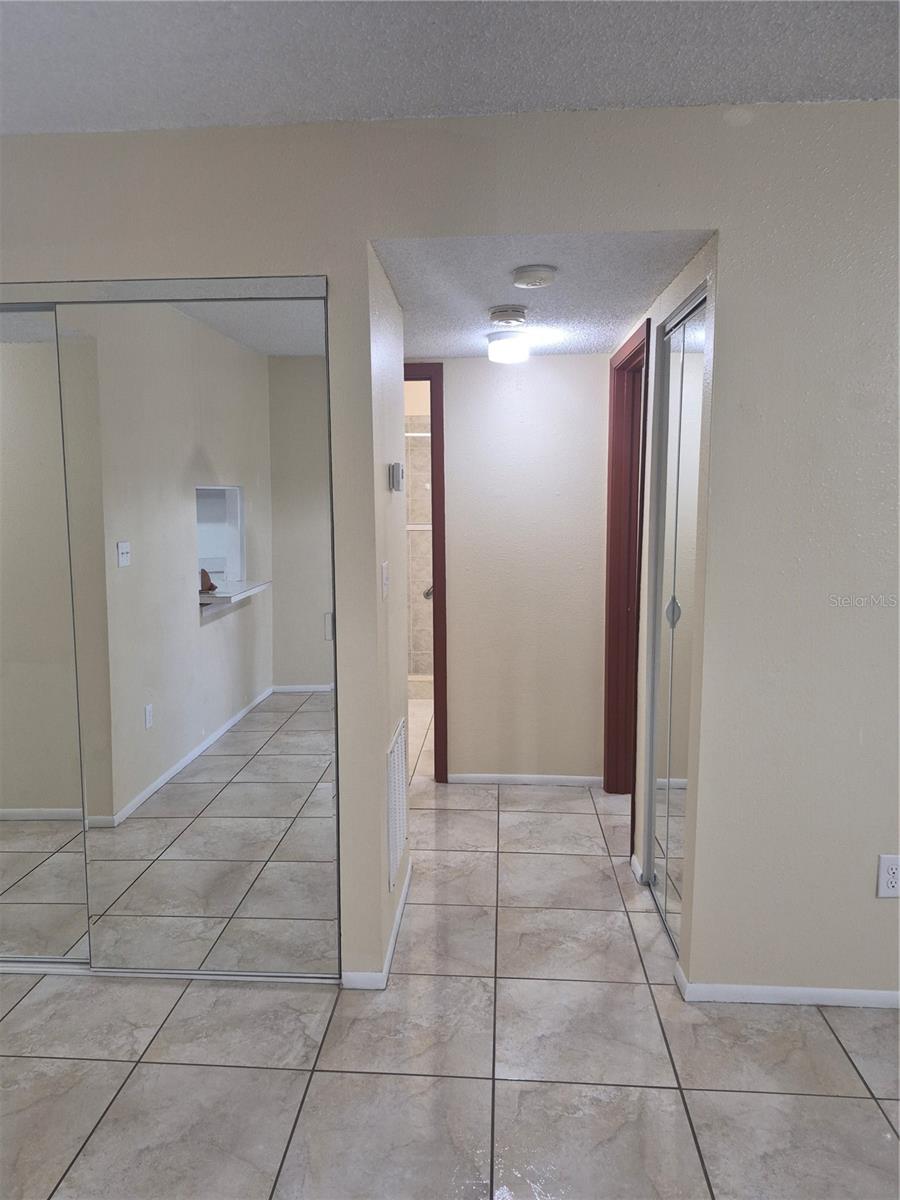 View from dining to bedrooms and bathroom