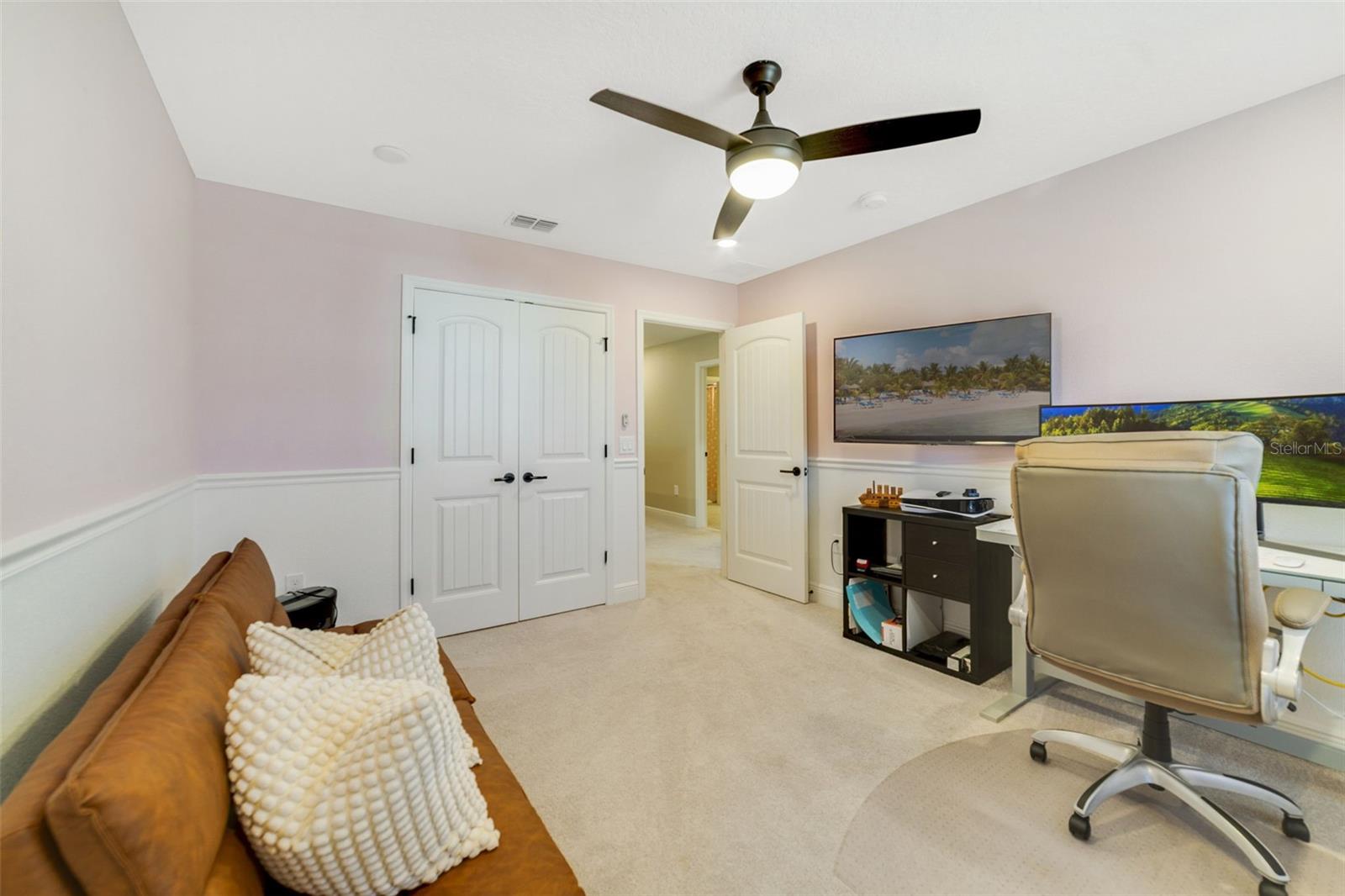 Three additional bedrooms and another full bath offer plenty of comfortable space for family and guests.  Bedroom 2.