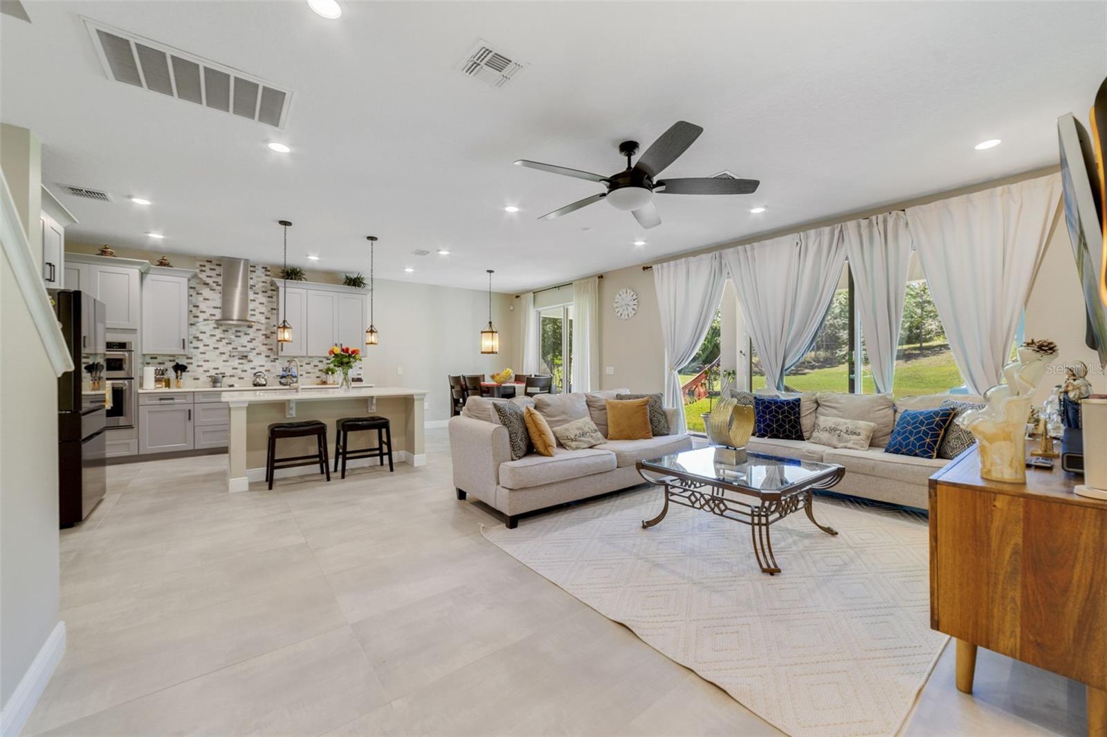 Step inside to an inviting OPEN-CONCEPT LAYOUT, where the chefs Kitchen overlooks the spacious Living area. Step inside to an inviting OPEN-CONCEPT LAYOUT, where the chefs Kitchen overlooks the spacious Living area.