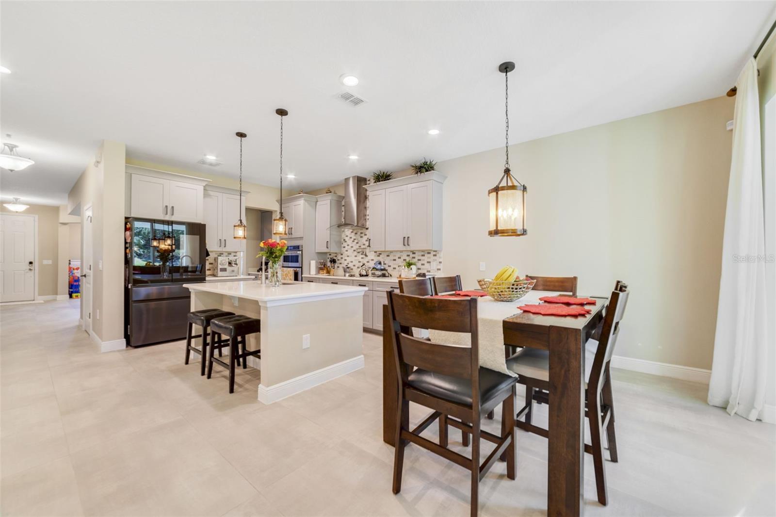 A charming Dinette nook completes the Kitchen, offering a comfortable place to enjoy daily meals with ease. A charming Dinette nook completes the Kitchen, offering a comfortable place to enjoy daily meals with ease.