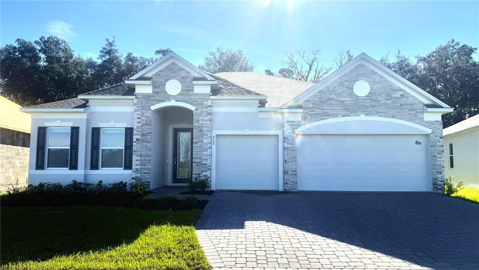 Stunning Exterior - Stone Accent, Driveway & Entry Pavers, 3-Car Garage