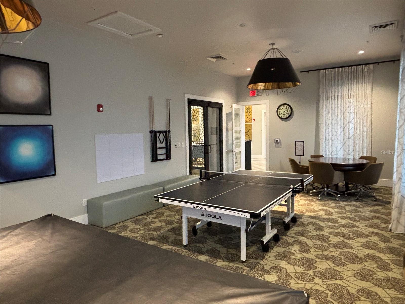 The Plaza - resident only game room with pool table, ping pong, card table, tv, etc.