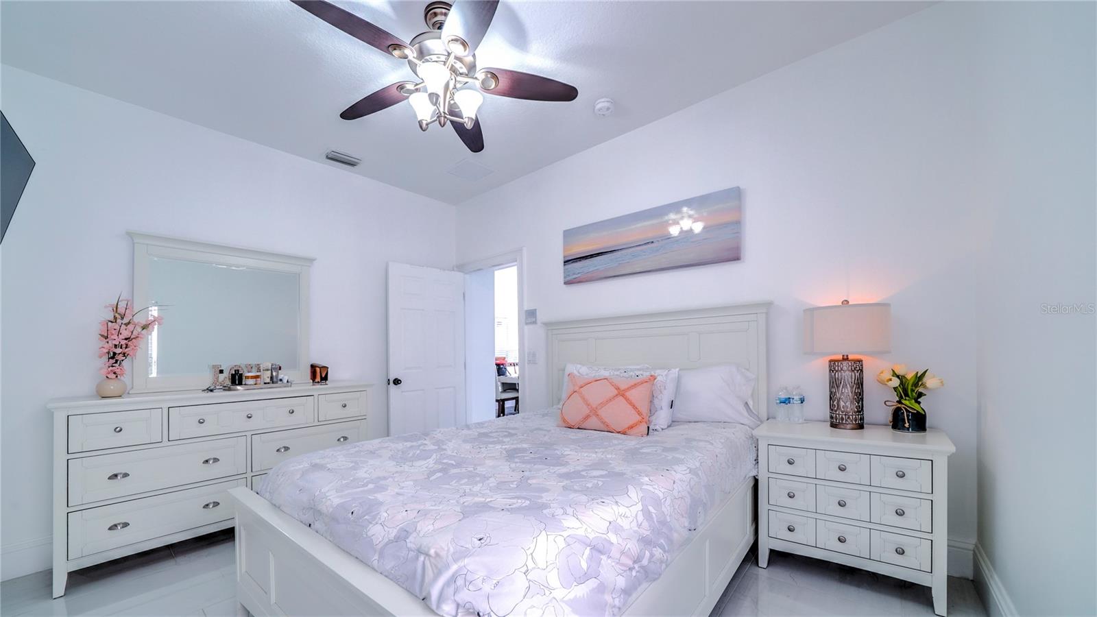 Guest bedroom on the first floor with a full bathroom.