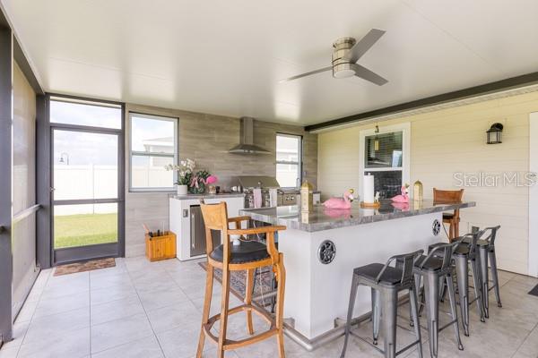 Dining and kitchen areas in lanai Dining and kitchen areas in lanai