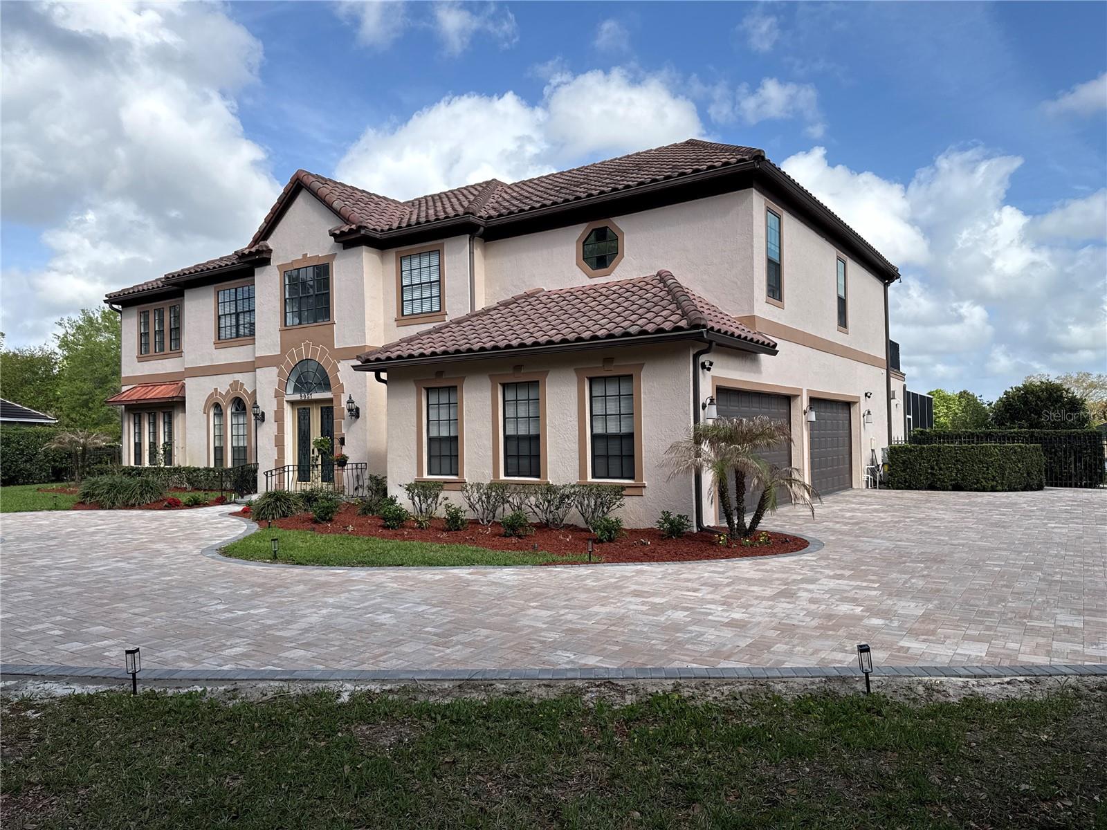 Welcome Home! Gorgeous mediterranean style estate set on almost 3/4 acre. Custom circular paver driveway with fountain. Welcome Home! Gorgeous mediterranean style estate set on almost 3/4 acre. Custom circular paver driveway with fountain.