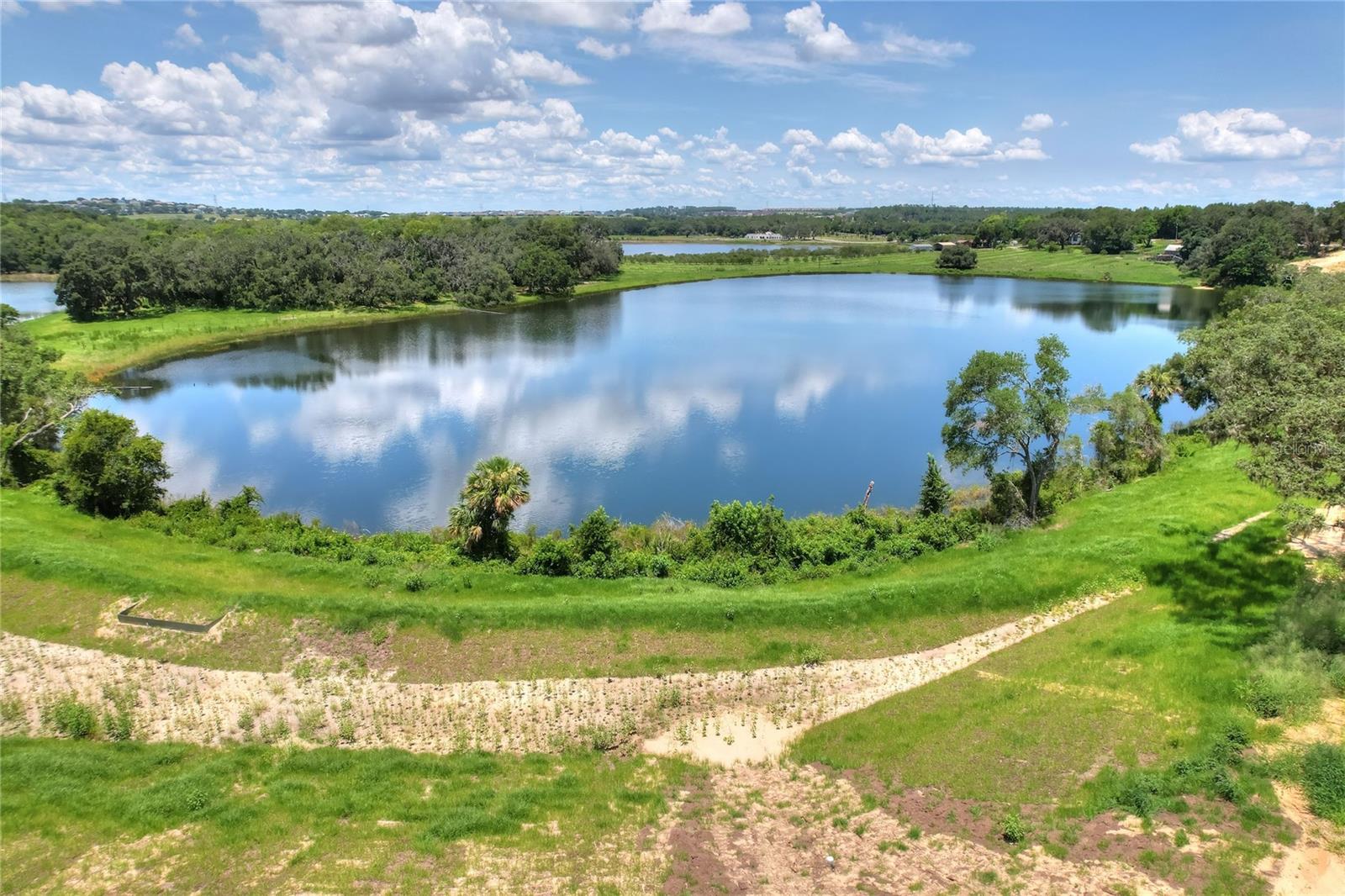 157 TRANQUIL MIRROR LAKE COURT, #Lot 10, Clermont, FL 34711