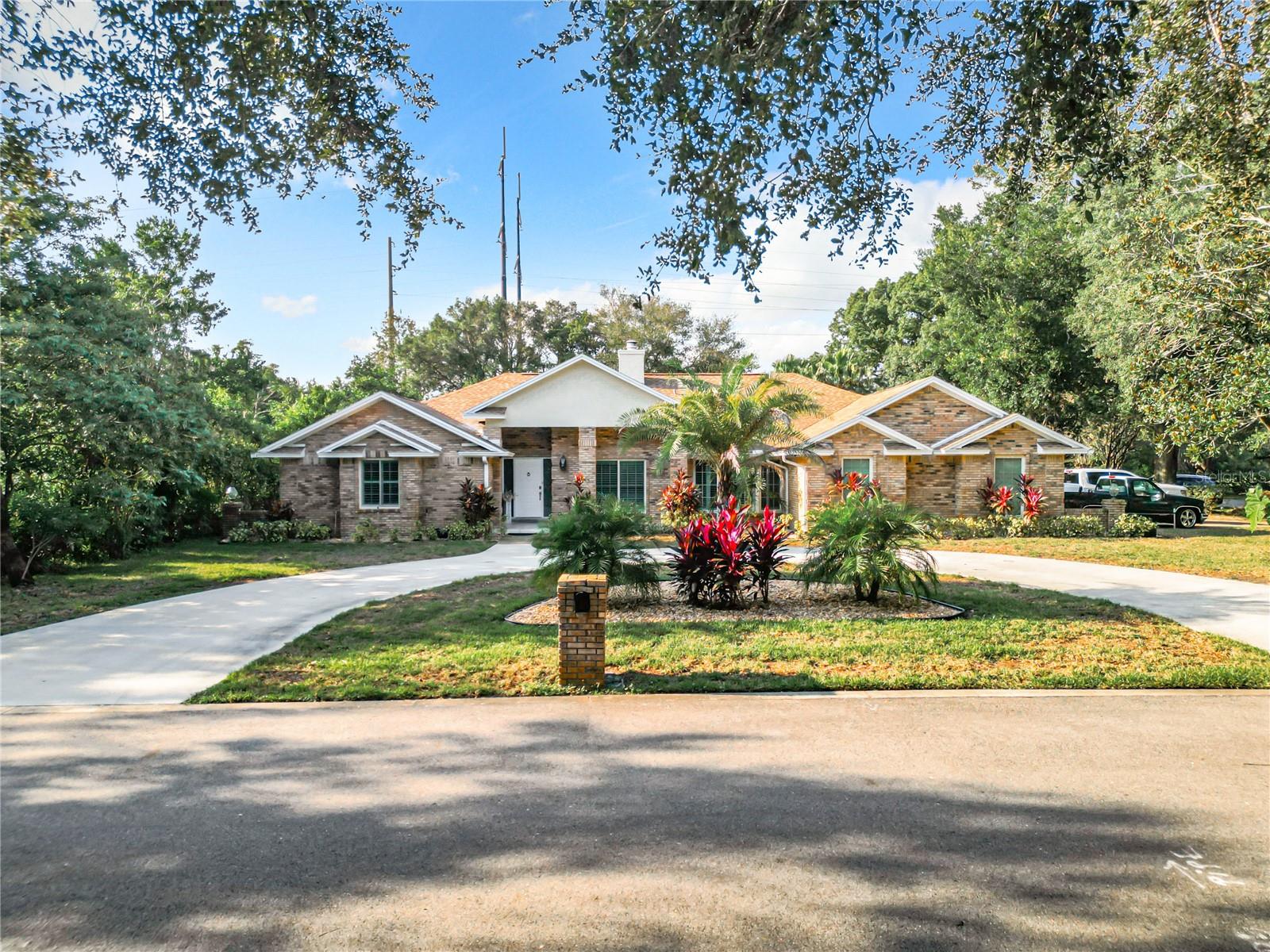Front circular driveway leads to estately entry Front circular driveway leads to estately entry