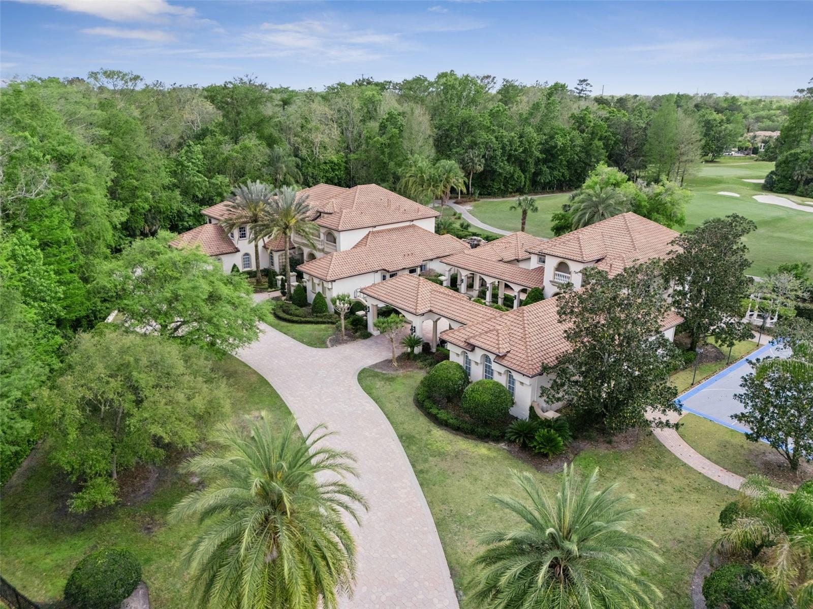 Welcome to your private compound with no neighbors on three sides, sited on 1.55 acres, gorgeous golf views of the 8th hole, separate 3100 sqft guest house, sports court with LED lights, beautiful pool/spa/cabana, putting green, koi pond, 6 car garage with an add'l golf cart bay and fully fenced around the entire property! Welcome to your private compound with no neighbors on three sides, sited on 1.55 acres, gorgeous golf views of the 8th hole, separate 3100 sqft guest house, sports court with LED lights, beautiful pool/spa/cabana, putting green, koi pond, 6 car garage with an add'l golf cart bay and fully fenced around the entire property!
