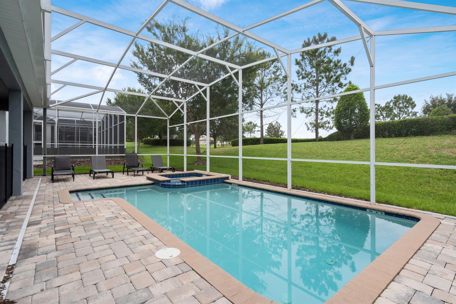 Screened in pool and spa Screened in pool and spa