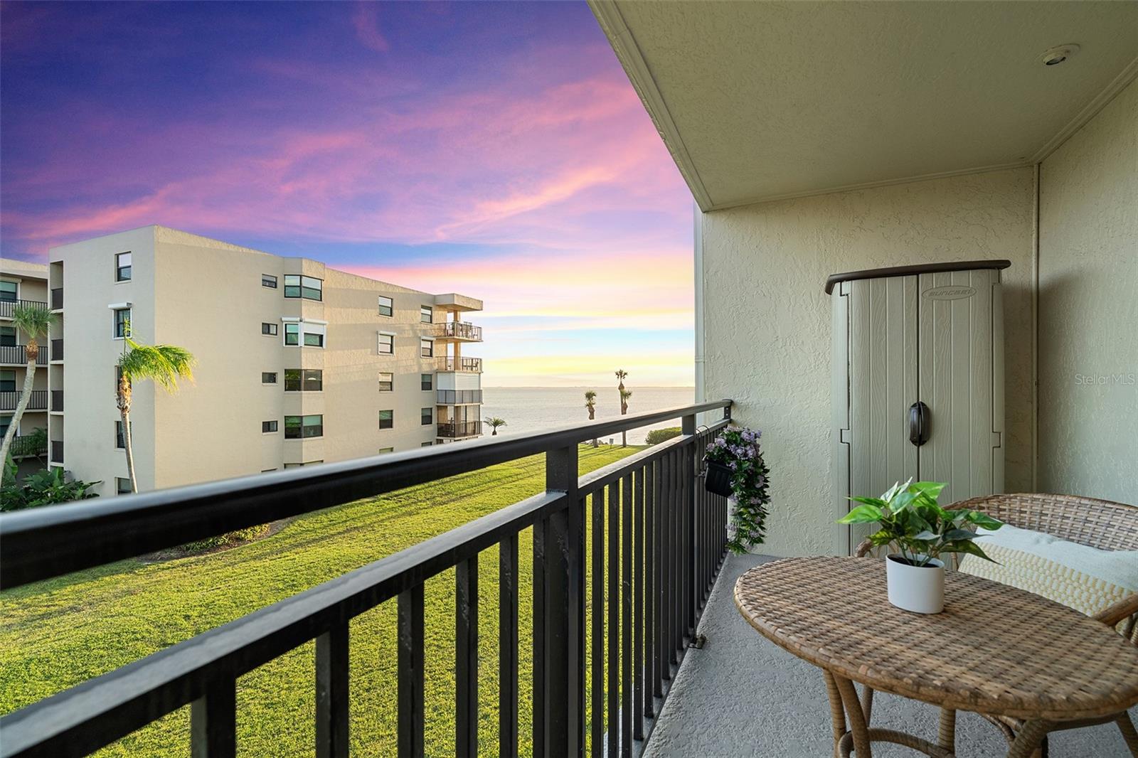 Sunset water views from unit's private balcony! Sunset water views from unit's private balcony!