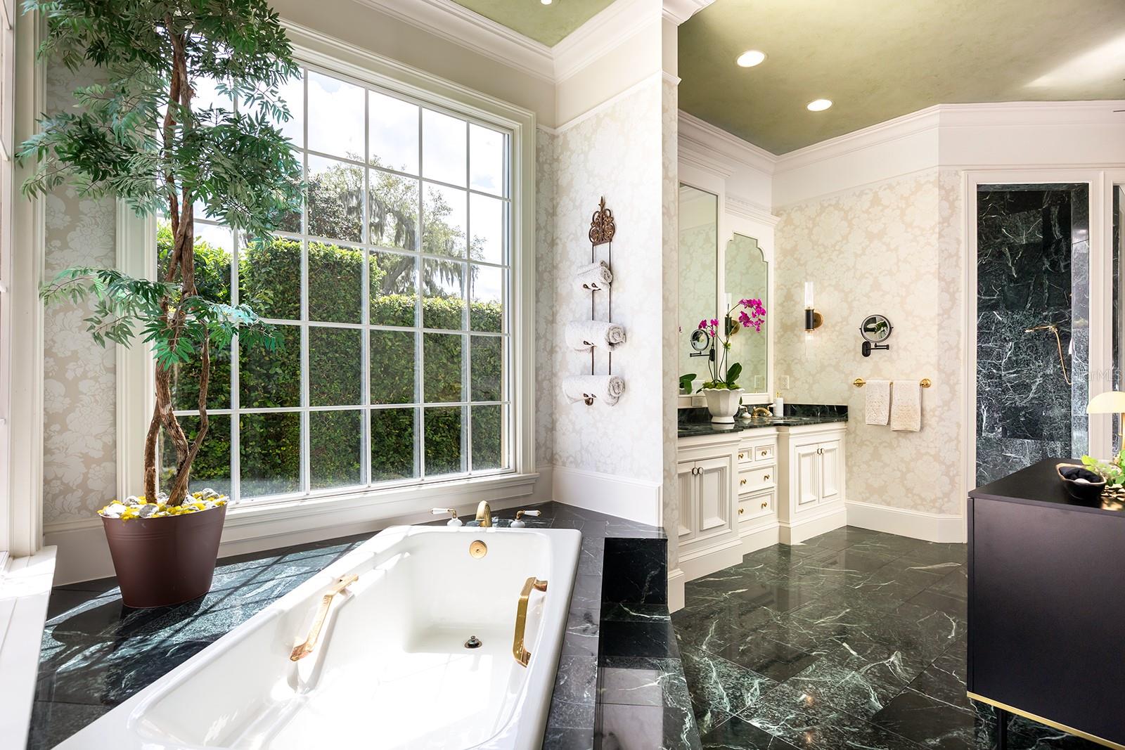 Step into the Roman tub. Run the bath add the bubbles & SOAK away the days troubles!