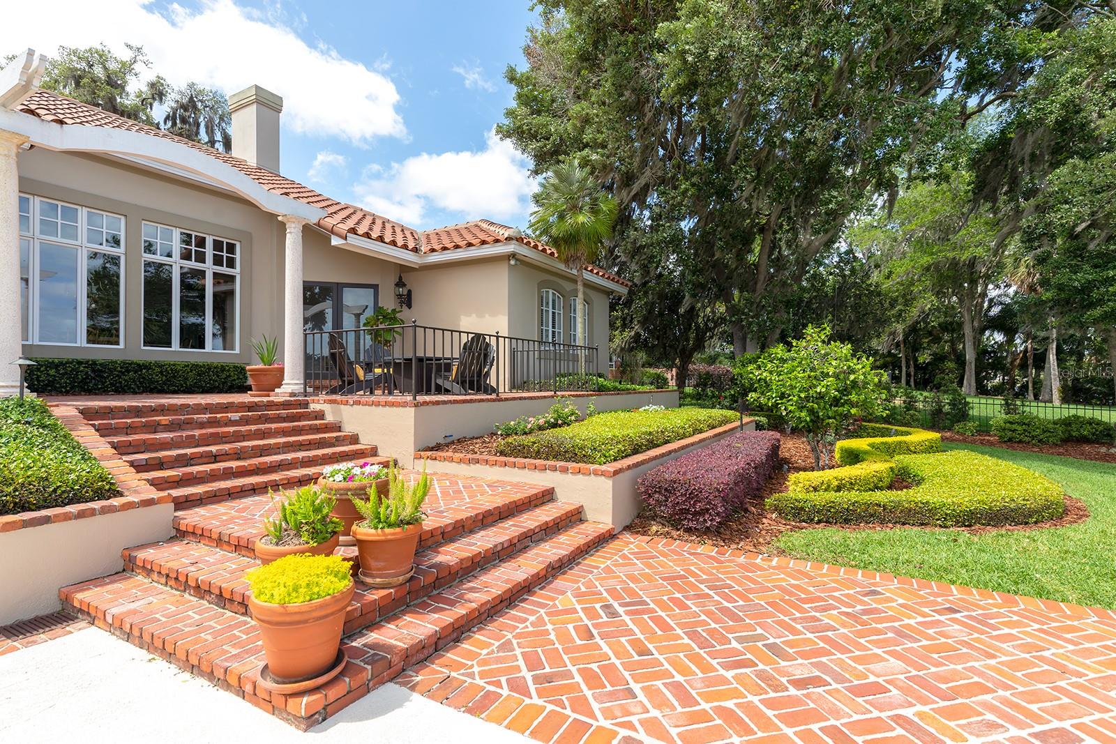 Generous use of St. Louis brick, wood flooring, and wrought iron artistry.