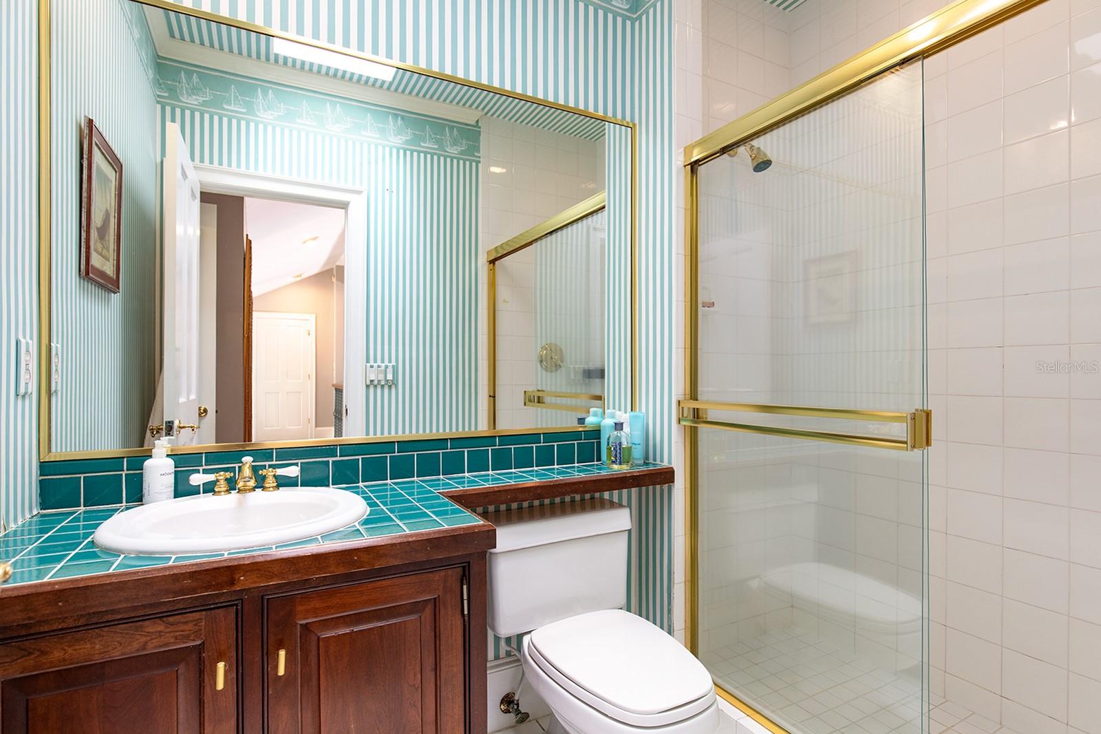 One of the many roomy bathrooms through the home