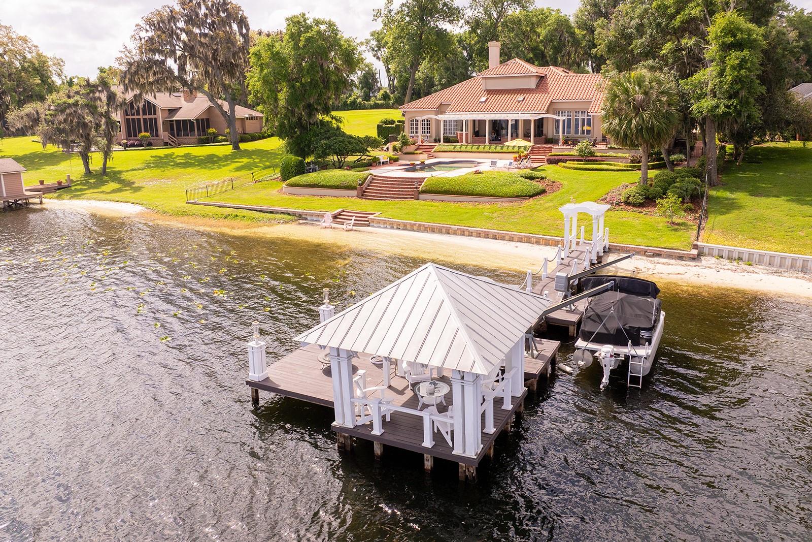 This CUSTOM estate boasts over $380,000 in updates and renovations.